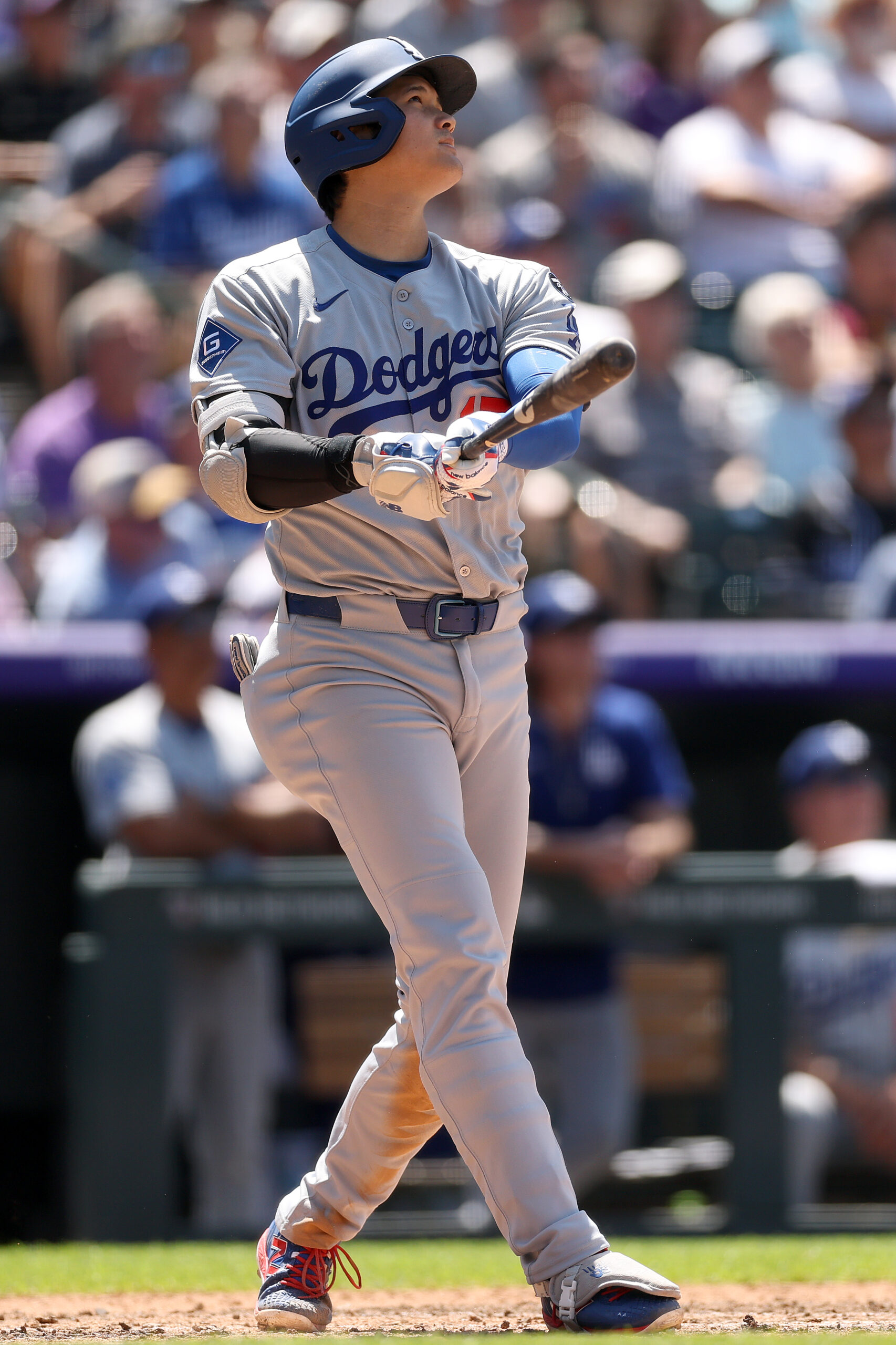 Dodgers star Shohei Ohtani hits a solo home run during...