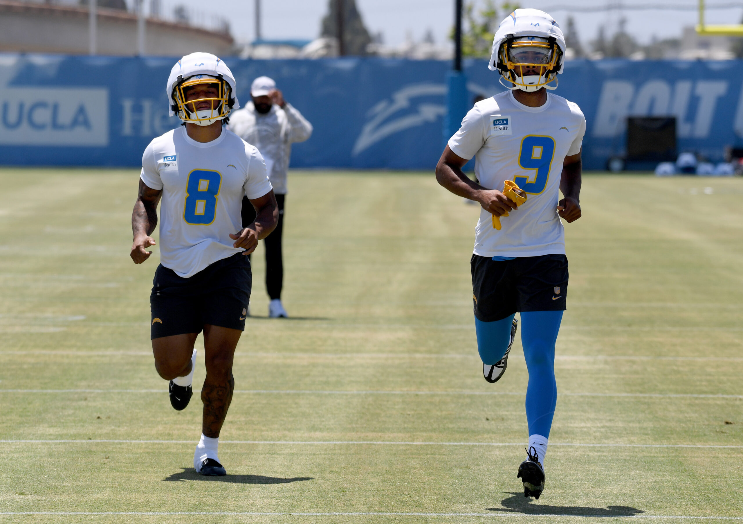 Chargers rookie running back Omarion Hampton, left, and rookie wide...