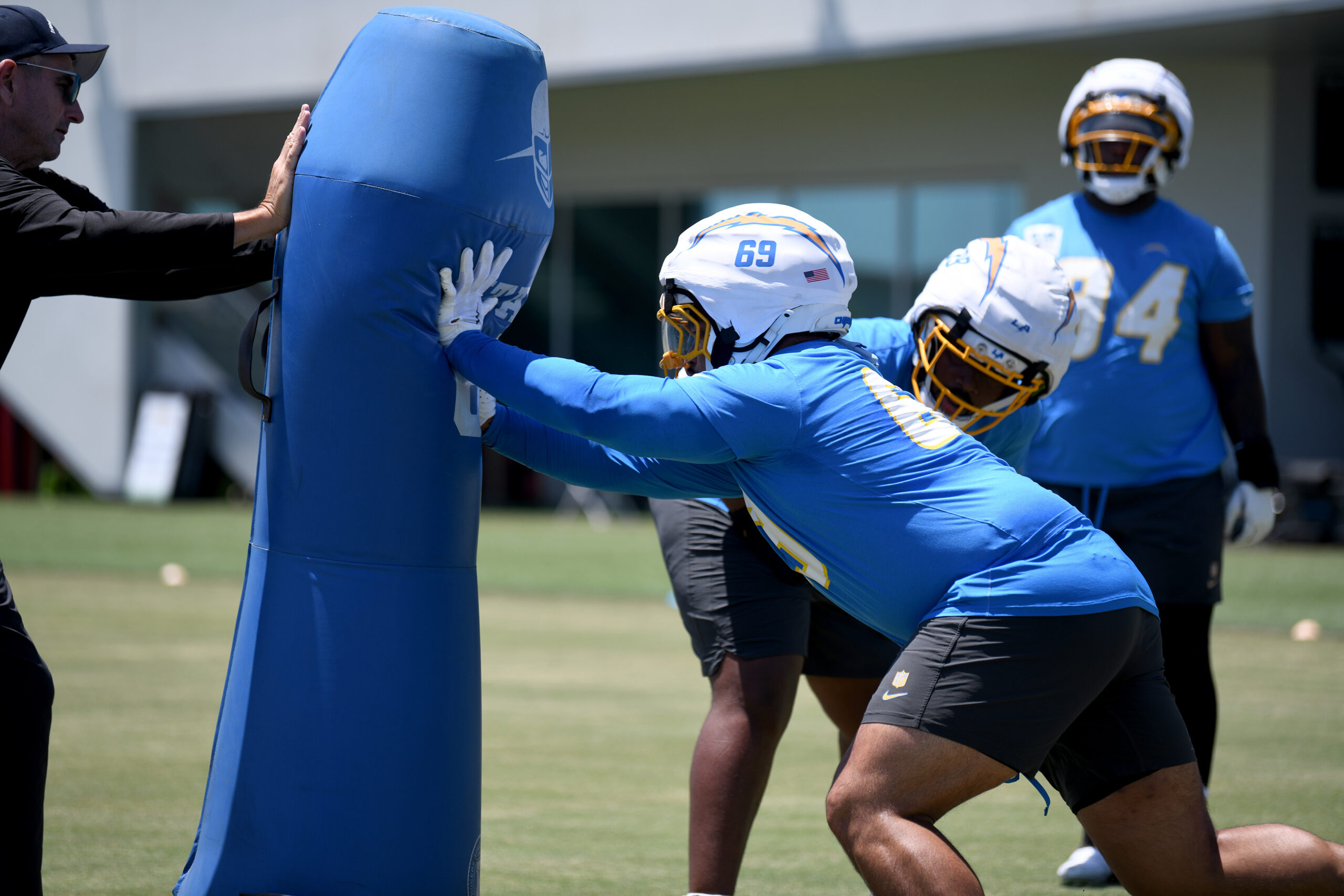 Rookie defensive tackle Josh Fuga (69) goes through drills during...