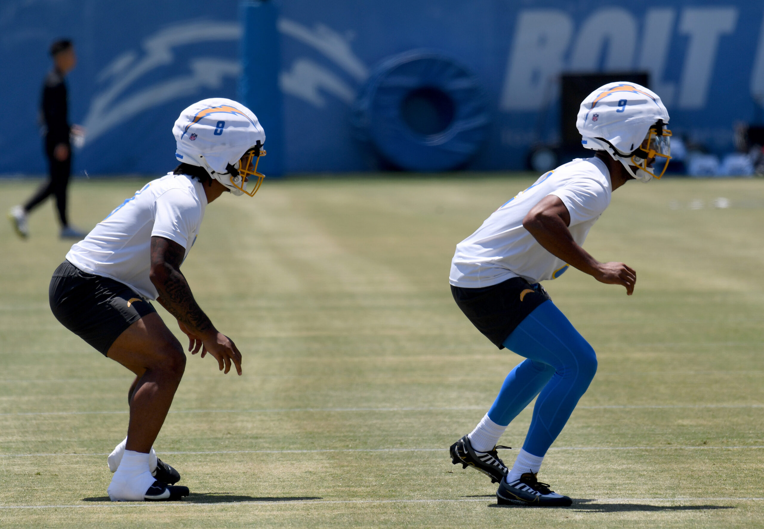 Chargers rookie running back Omarion Hampton, left, and rookie wide...