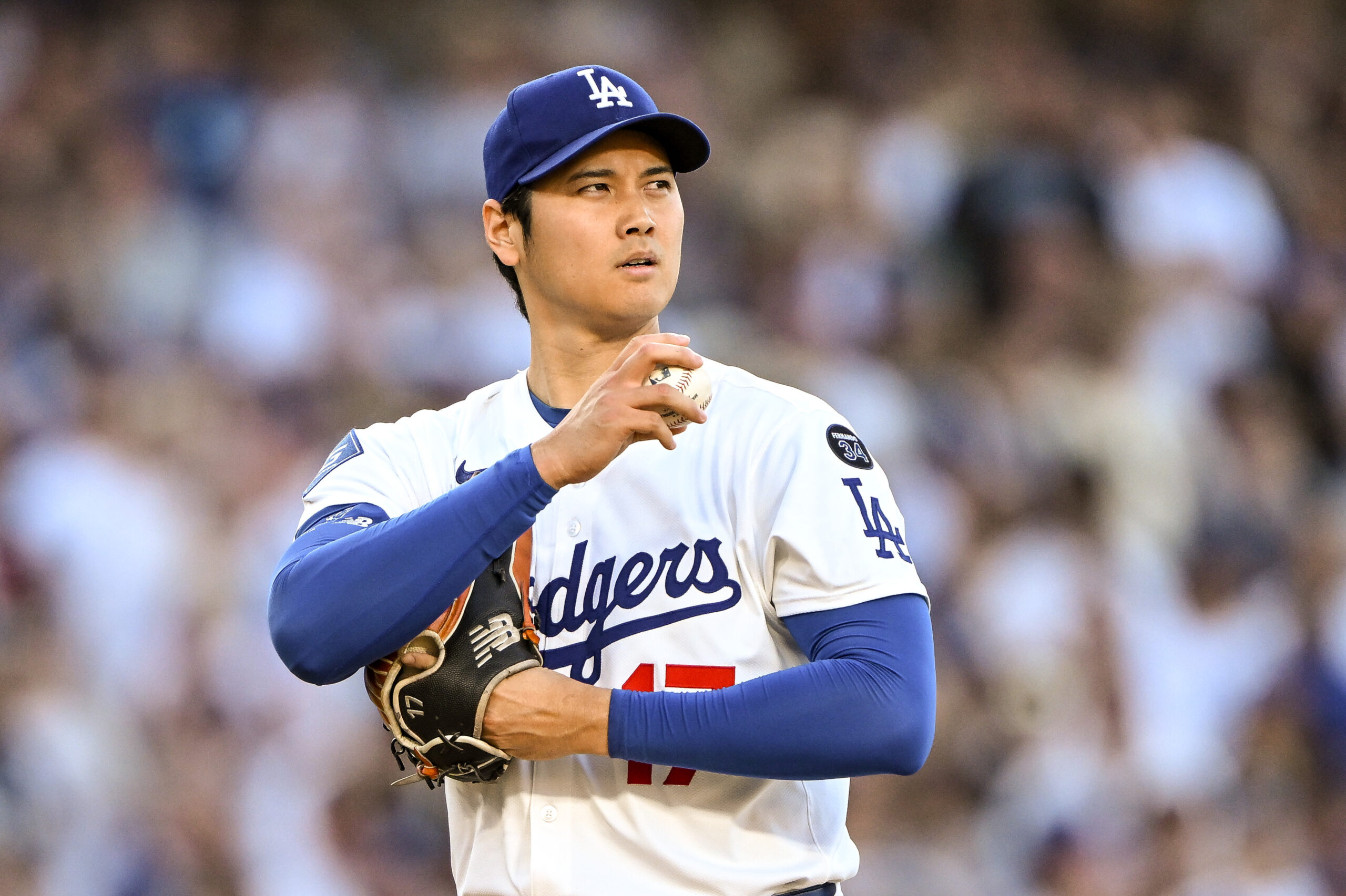 Dodgers starting pitcher Shohei Ohtani takes the mound during the...