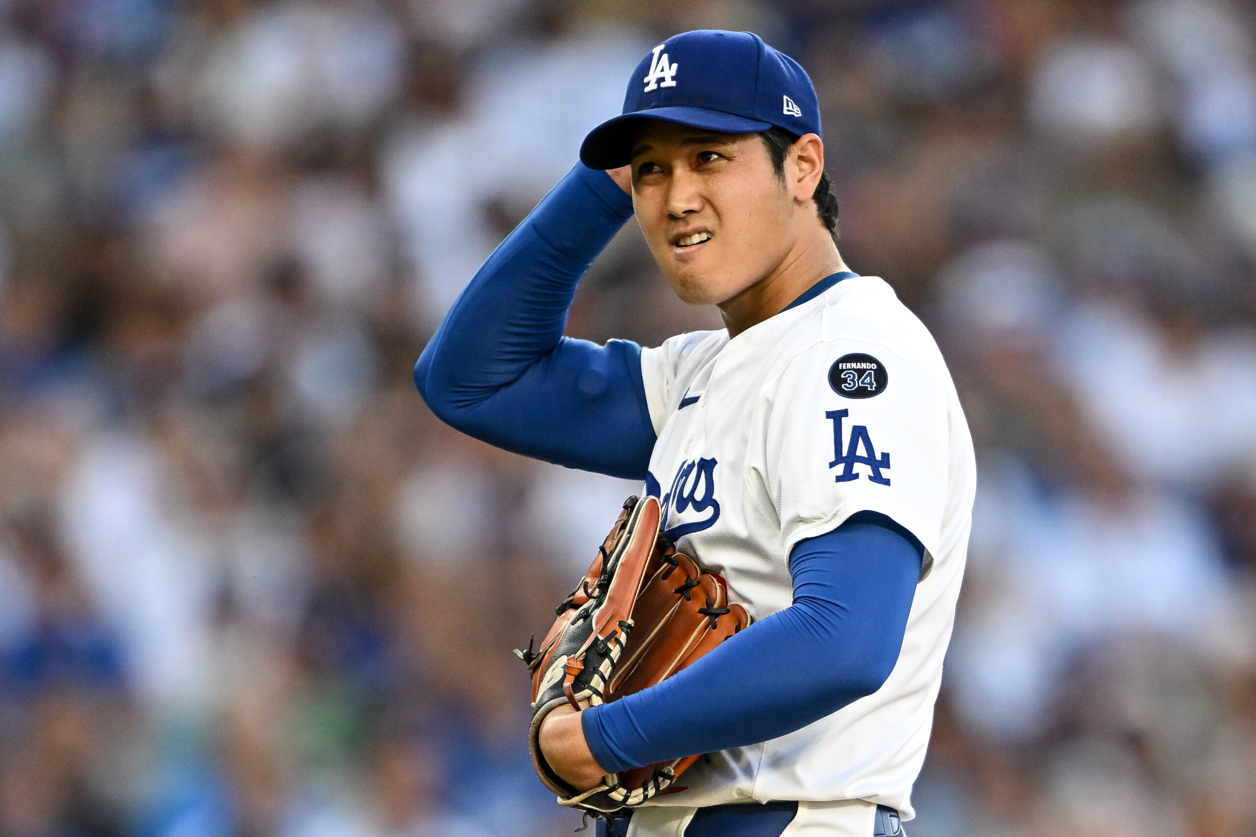 Dodgers starting pitcher Shohei Ohtani takes the mound during the...