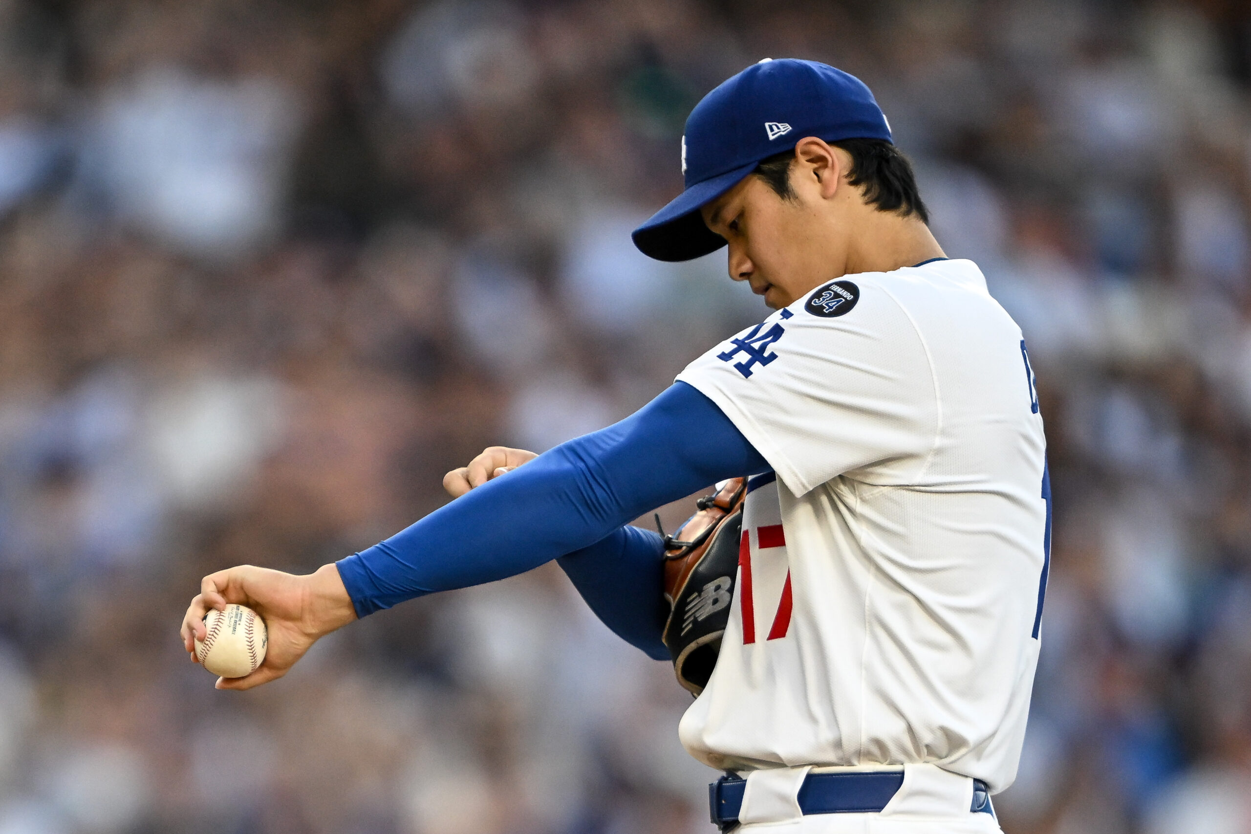 Dodgers starting pitcher Shohei Ohtani takes the mound during the...