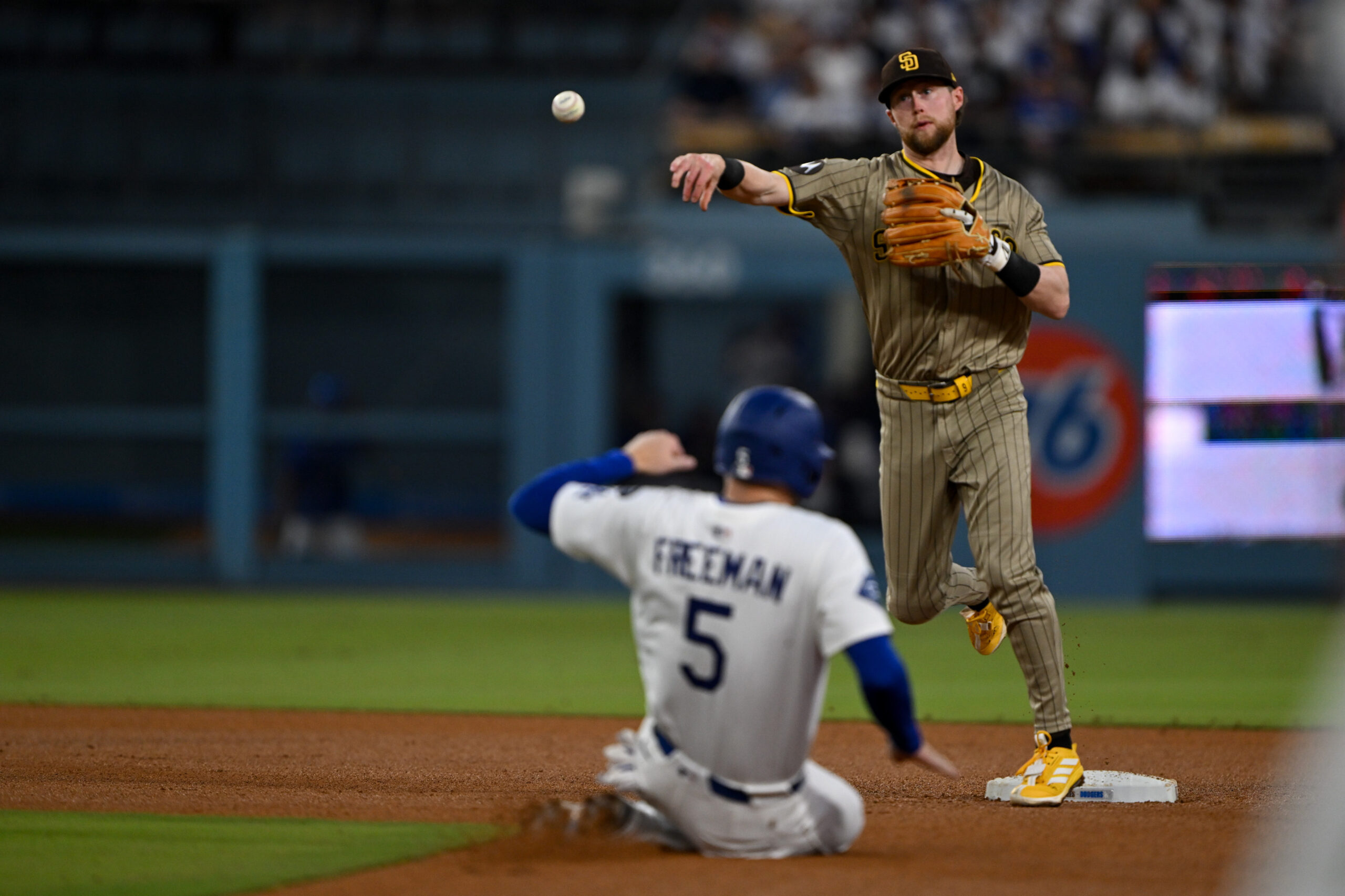 The Dodgers’ Freddie Freeman is forced out at second base...