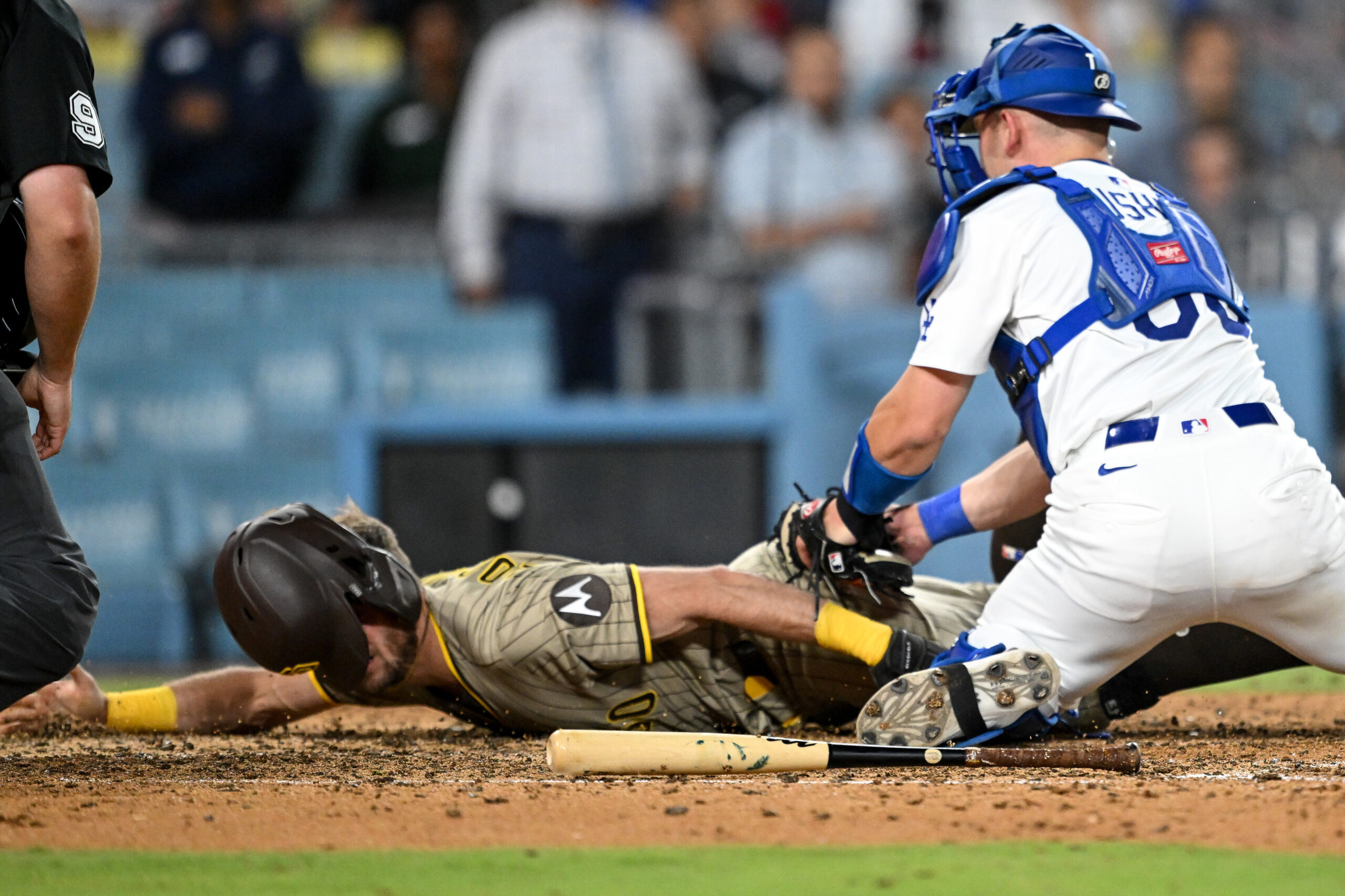 Dodgers catcher Dalton Rushing tags the San Diego Padres’ Brandon...