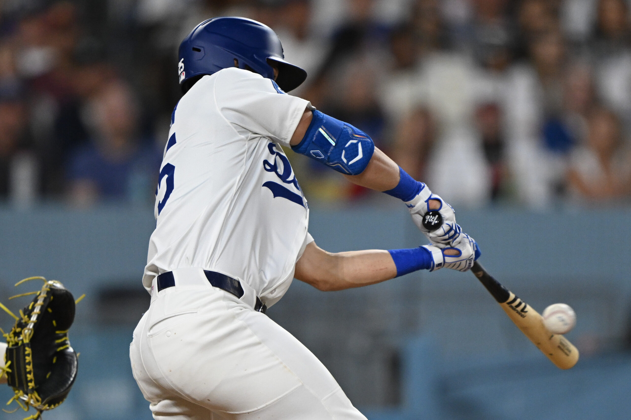The Dodgers’ Tommy Edman connects for a single during the...