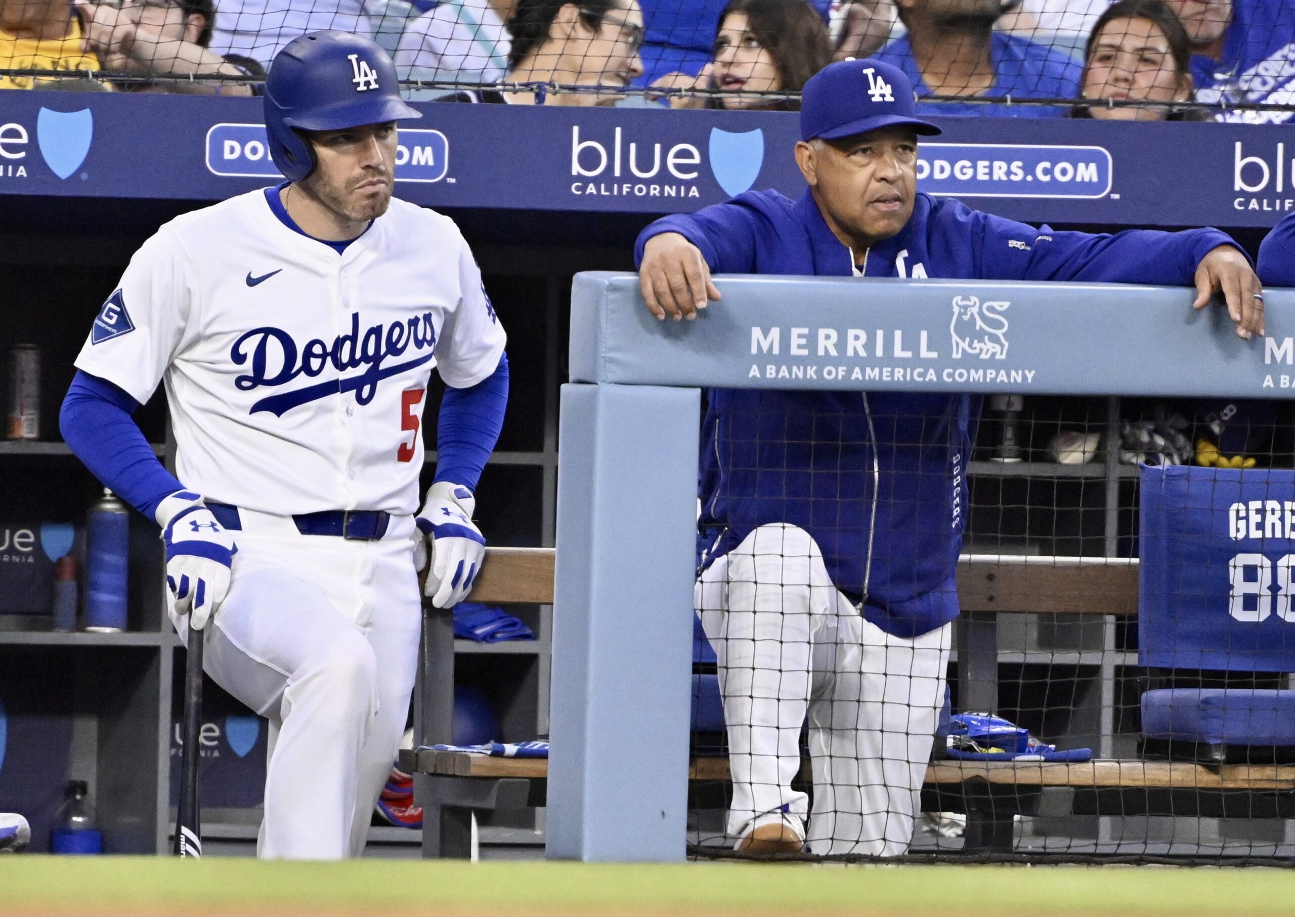 Dodgers manager Dave Roberts, right, and first baseman Freddie Freeman...