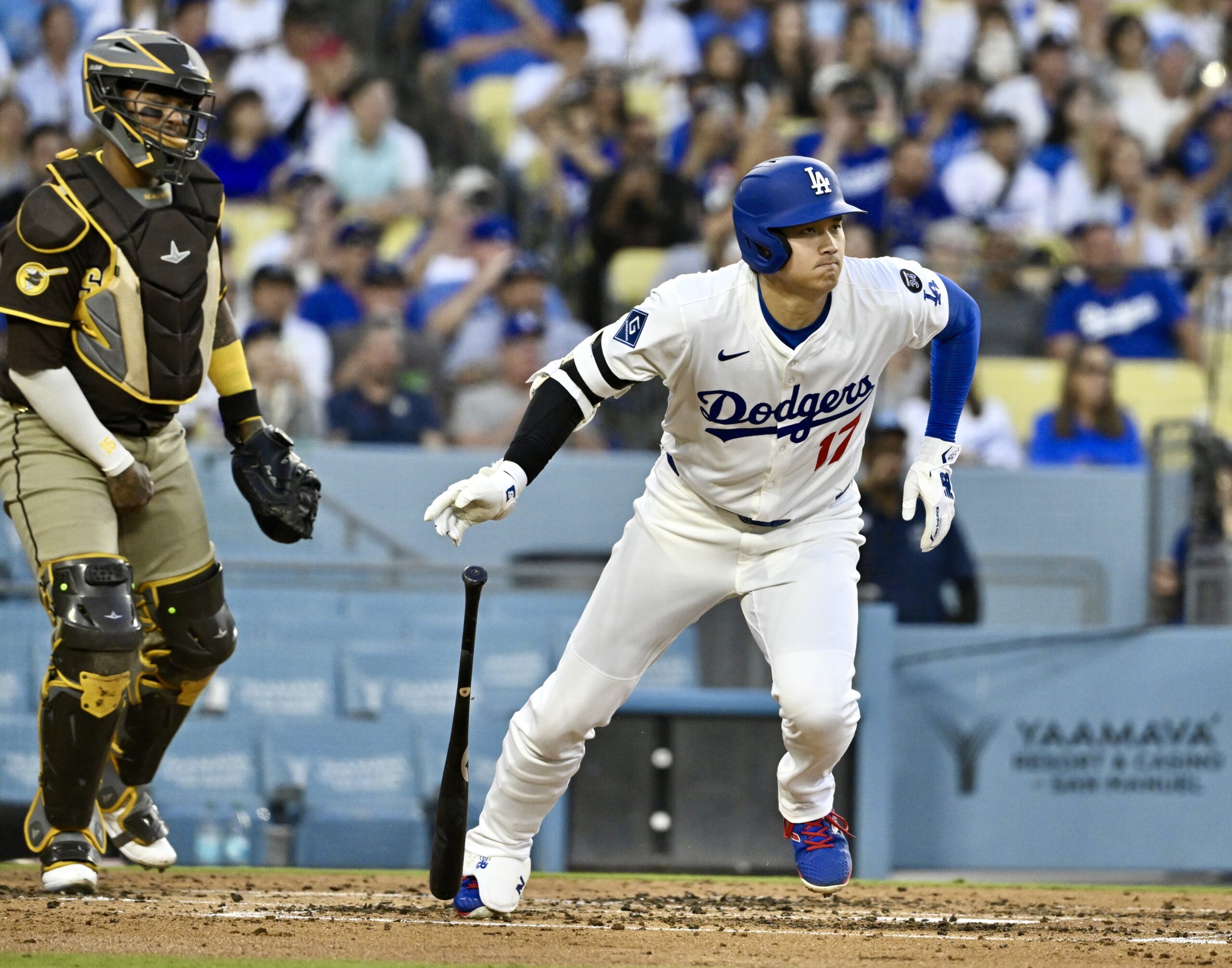 Dodgers star Shohei Ohtani singles against the San Diego Padres...