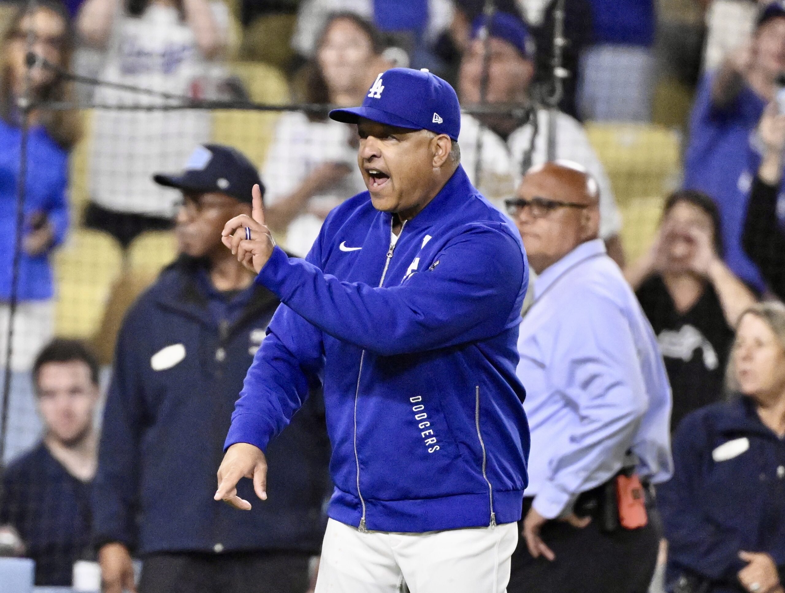 Dodgers manager Dave Roberts reacts after the benches cleared when...
