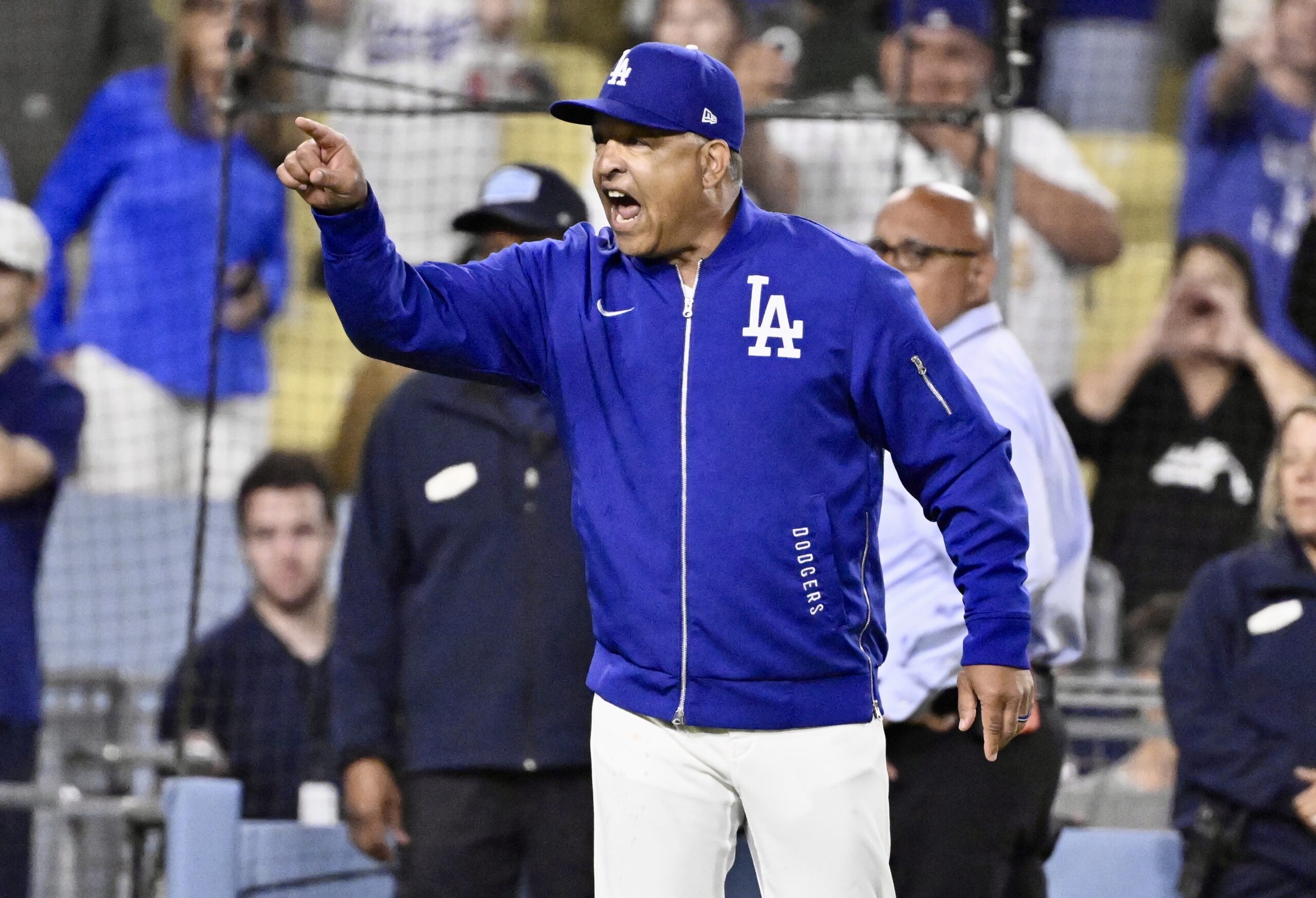 Dodgers manager Dave Roberts reacts after the benches cleared when...