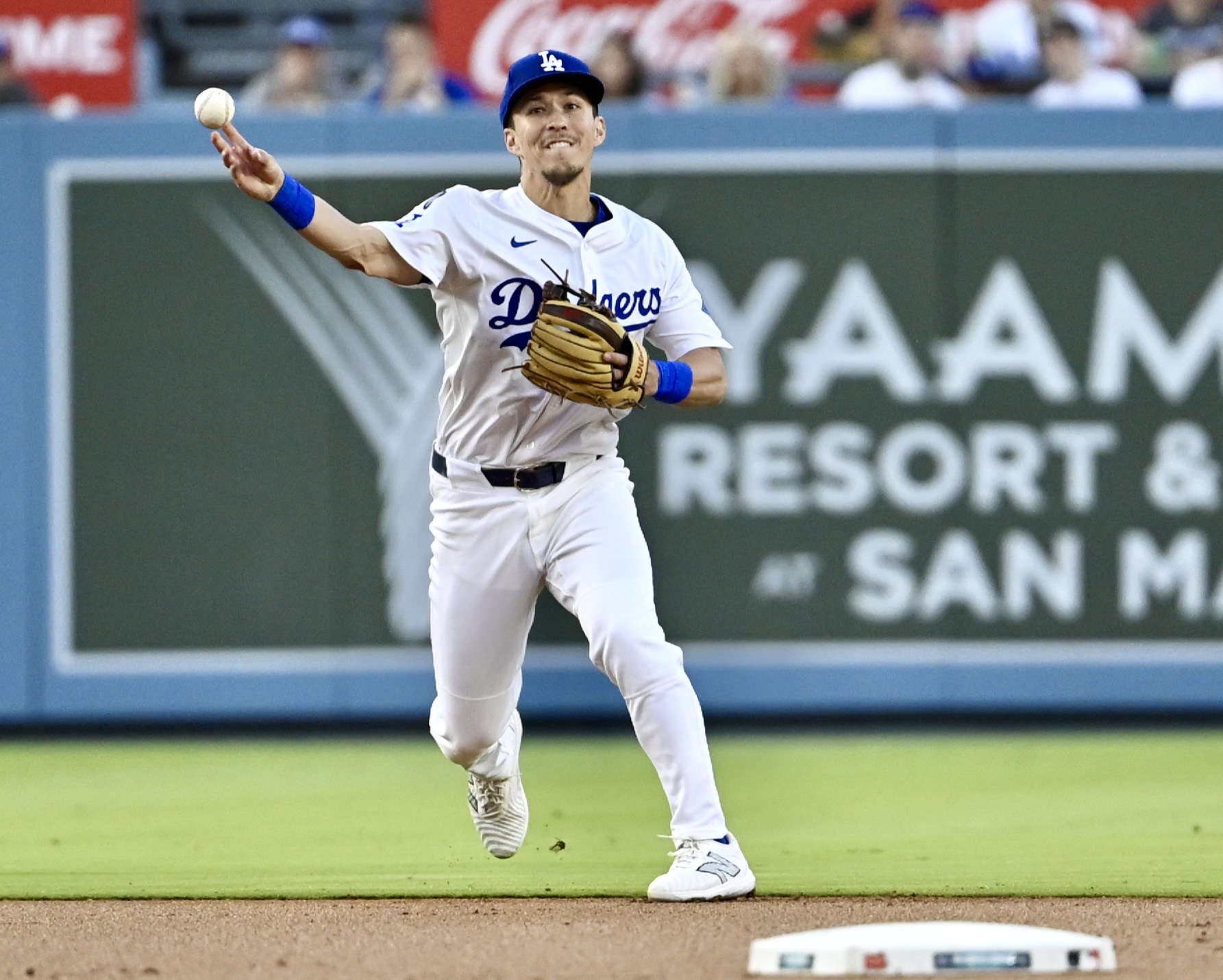Dodgers second baseman Tommy Edman throws out the Washington Nationals’...