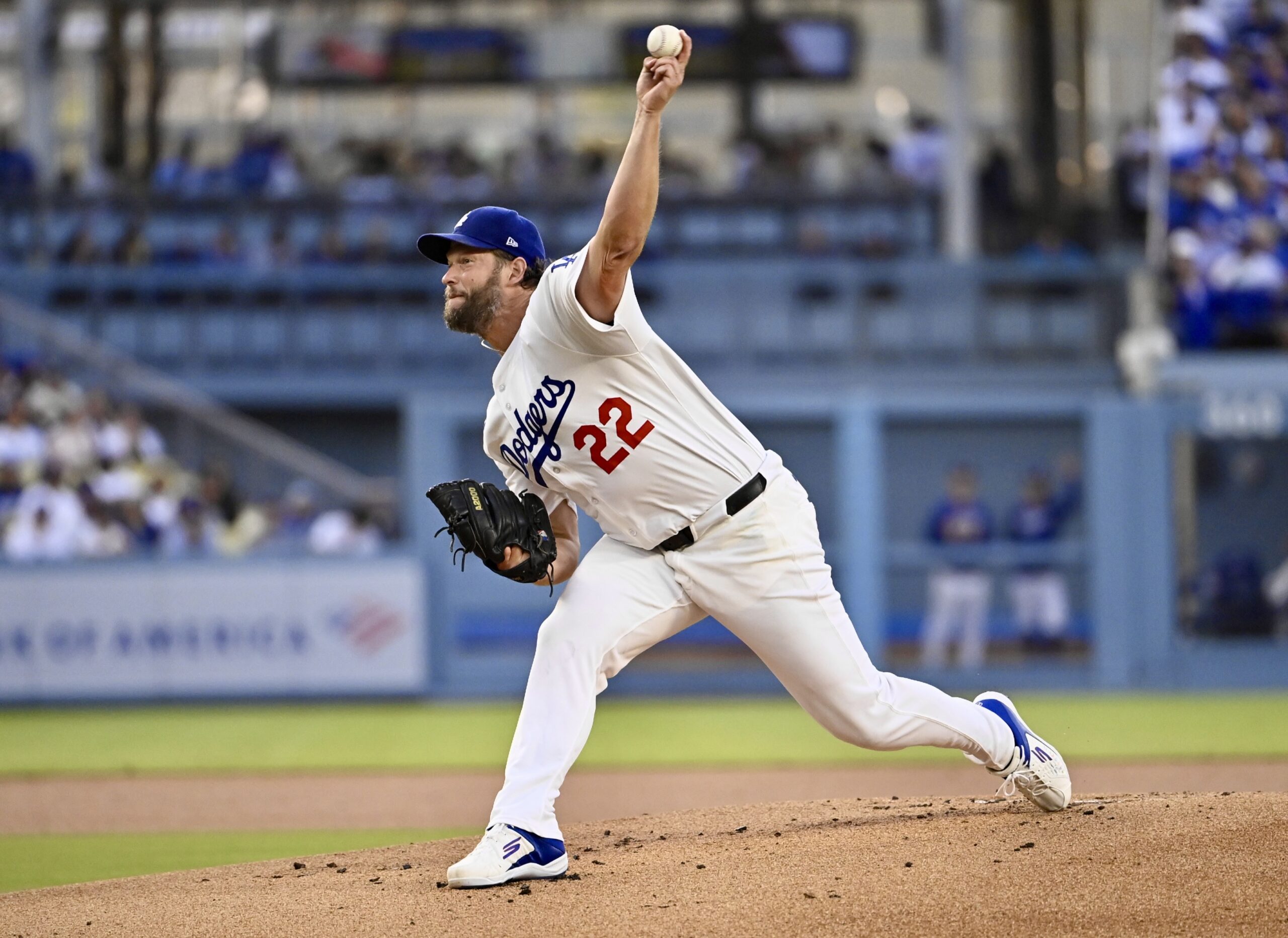 Dodgers starting pitcher Clayton Kershaw throws to the plate during...
