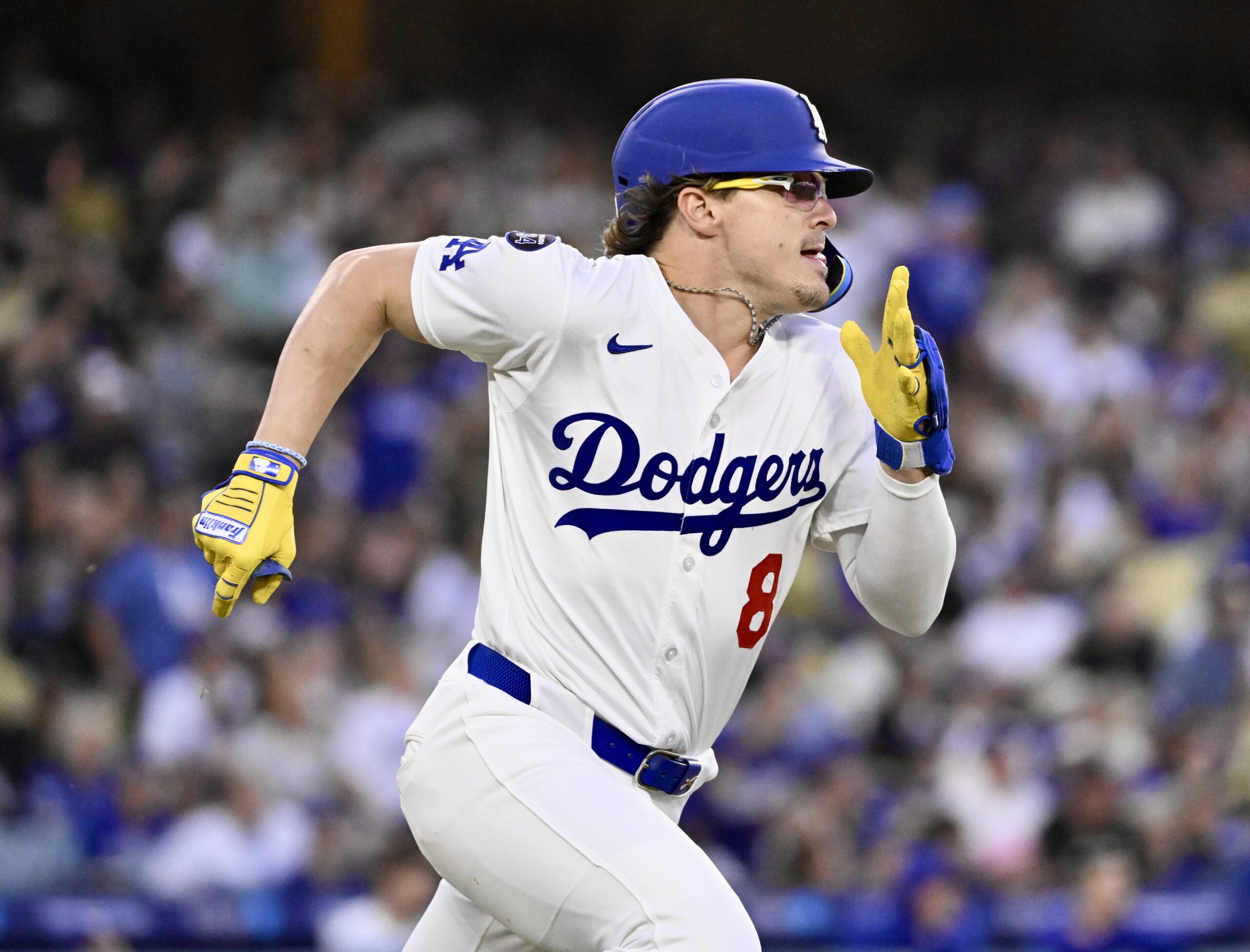 The Dodgers’ Kike Hernandez runs after hitting a double during...