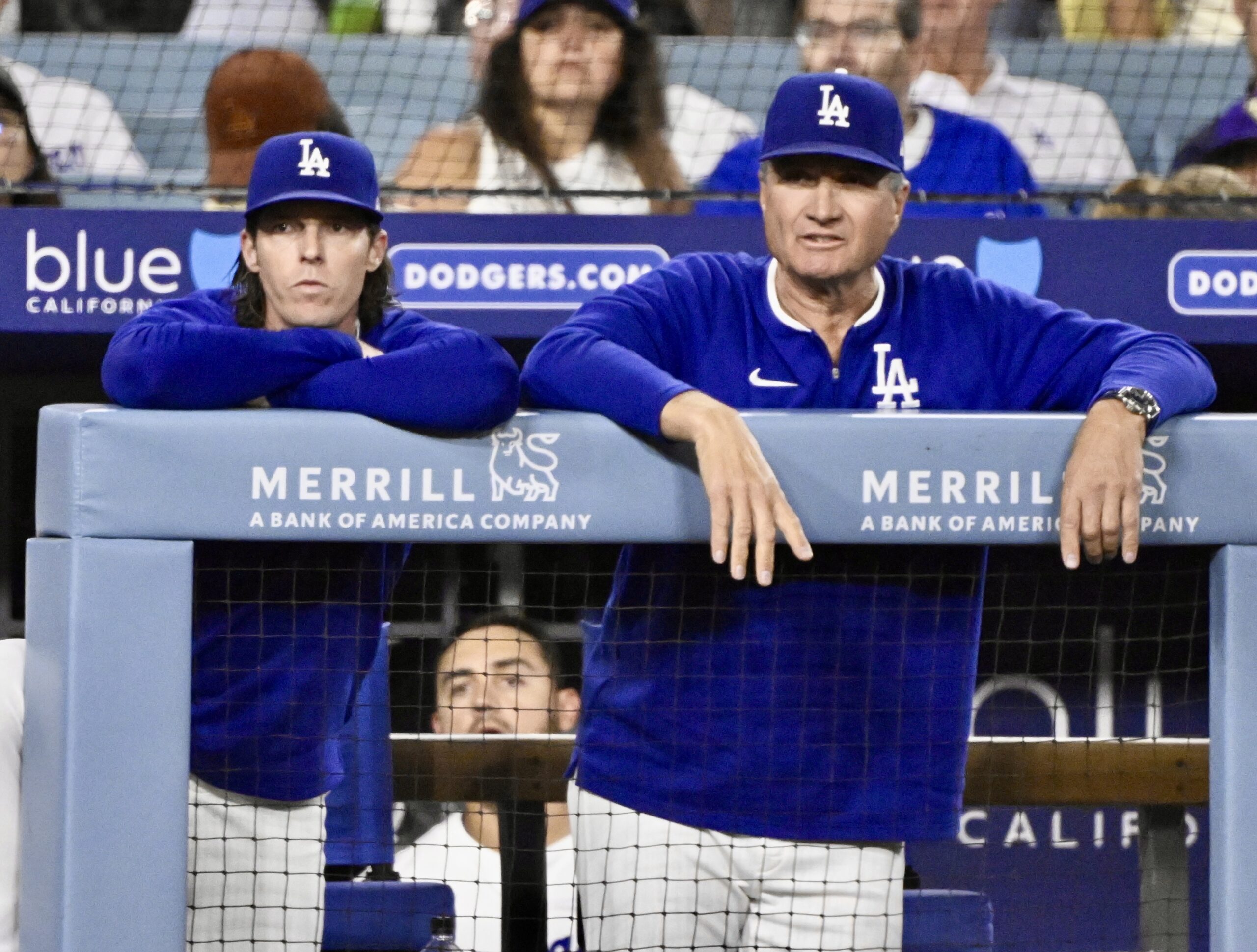 Dodgers bench coach and acting manager Danny Lehmann, left, and...