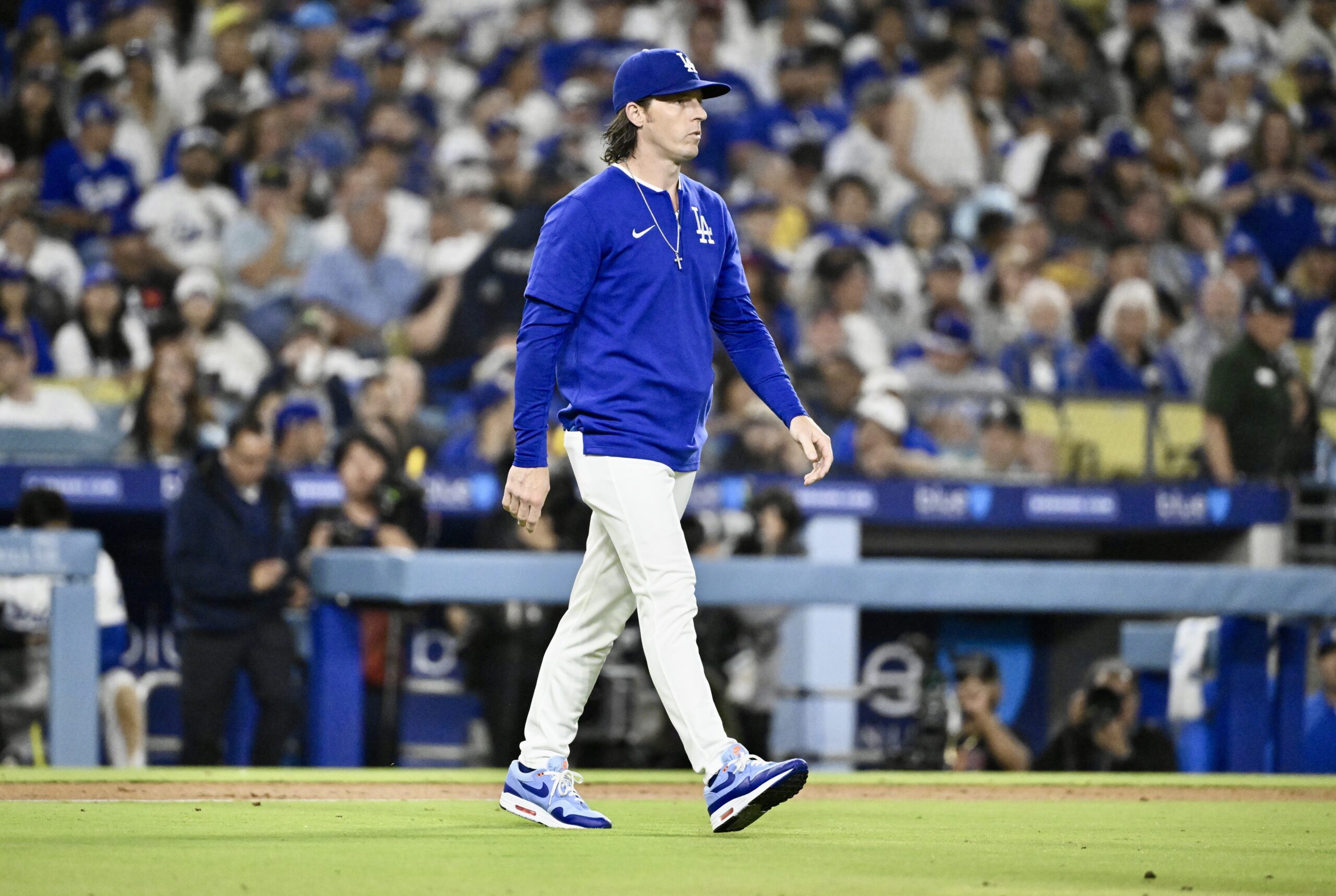 Dodgers bench coach and acting manager Danny Lehmann walks toward...