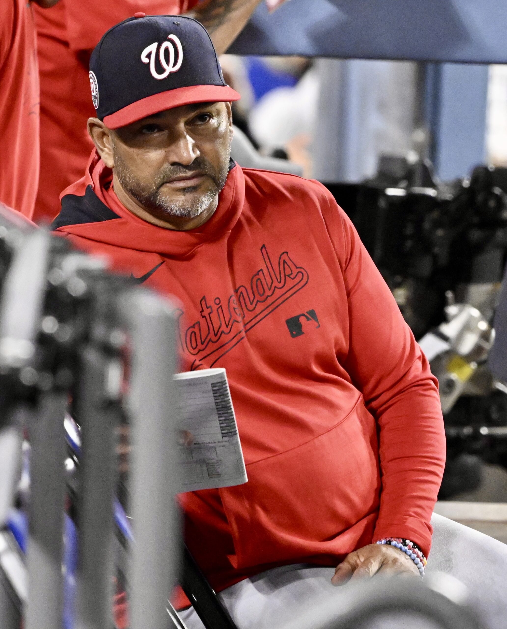 Washington Nationals manager Dave Martinez looks on from the dugout...