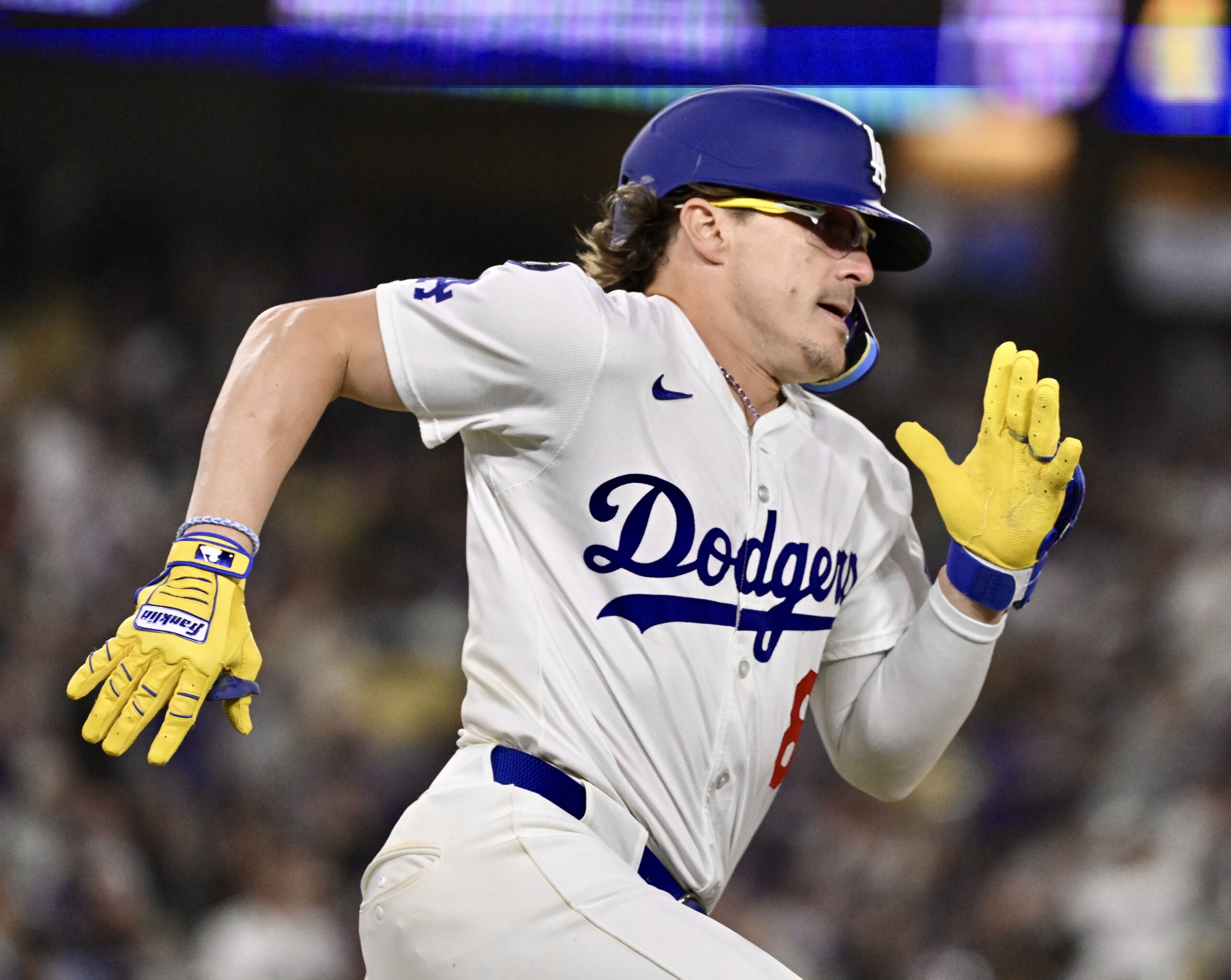 The Dodgers’ Kike Hernandez runs after hitting a double during...