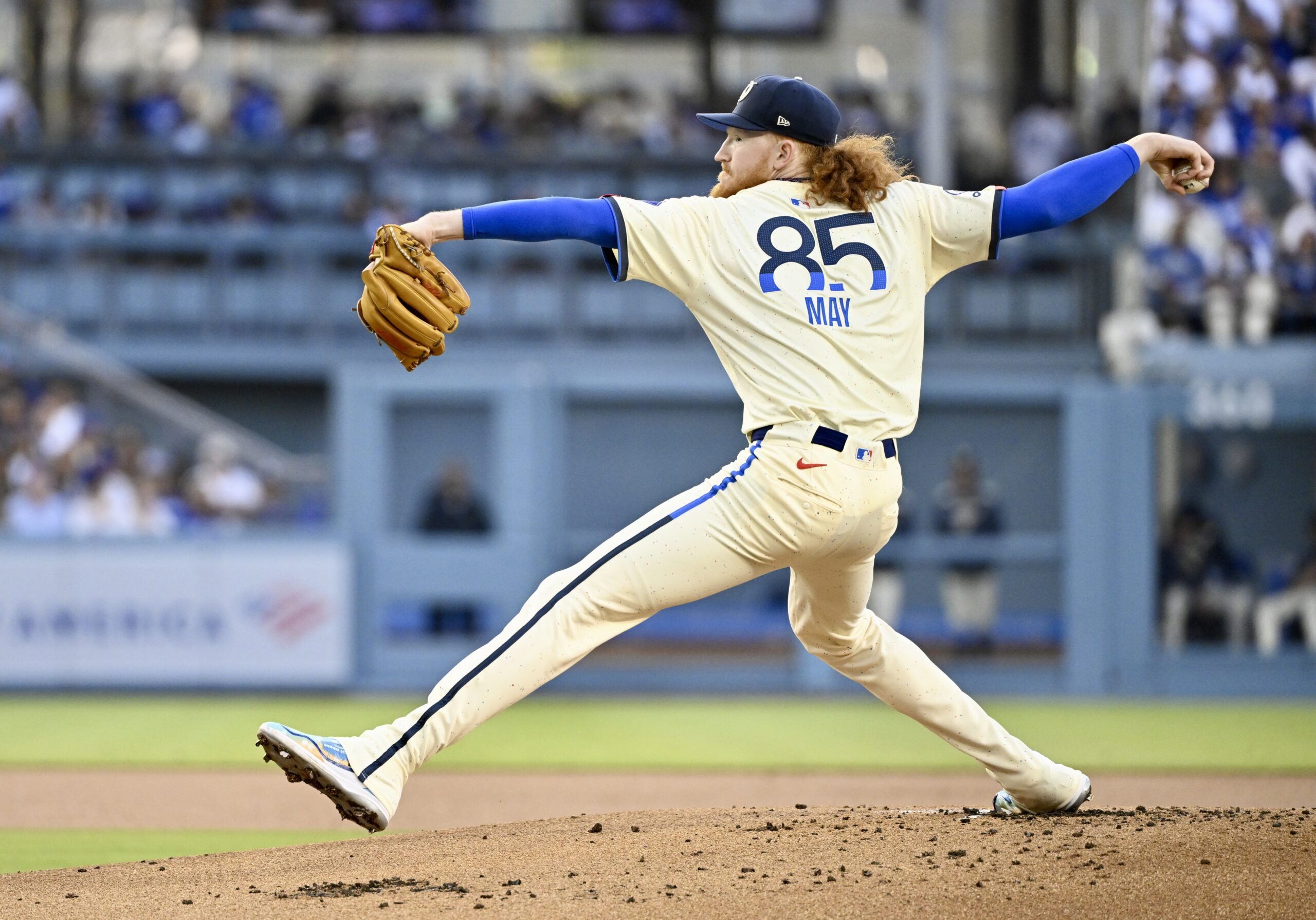 Starting pitcher Dustin May #85 of the Dodgers throws to...