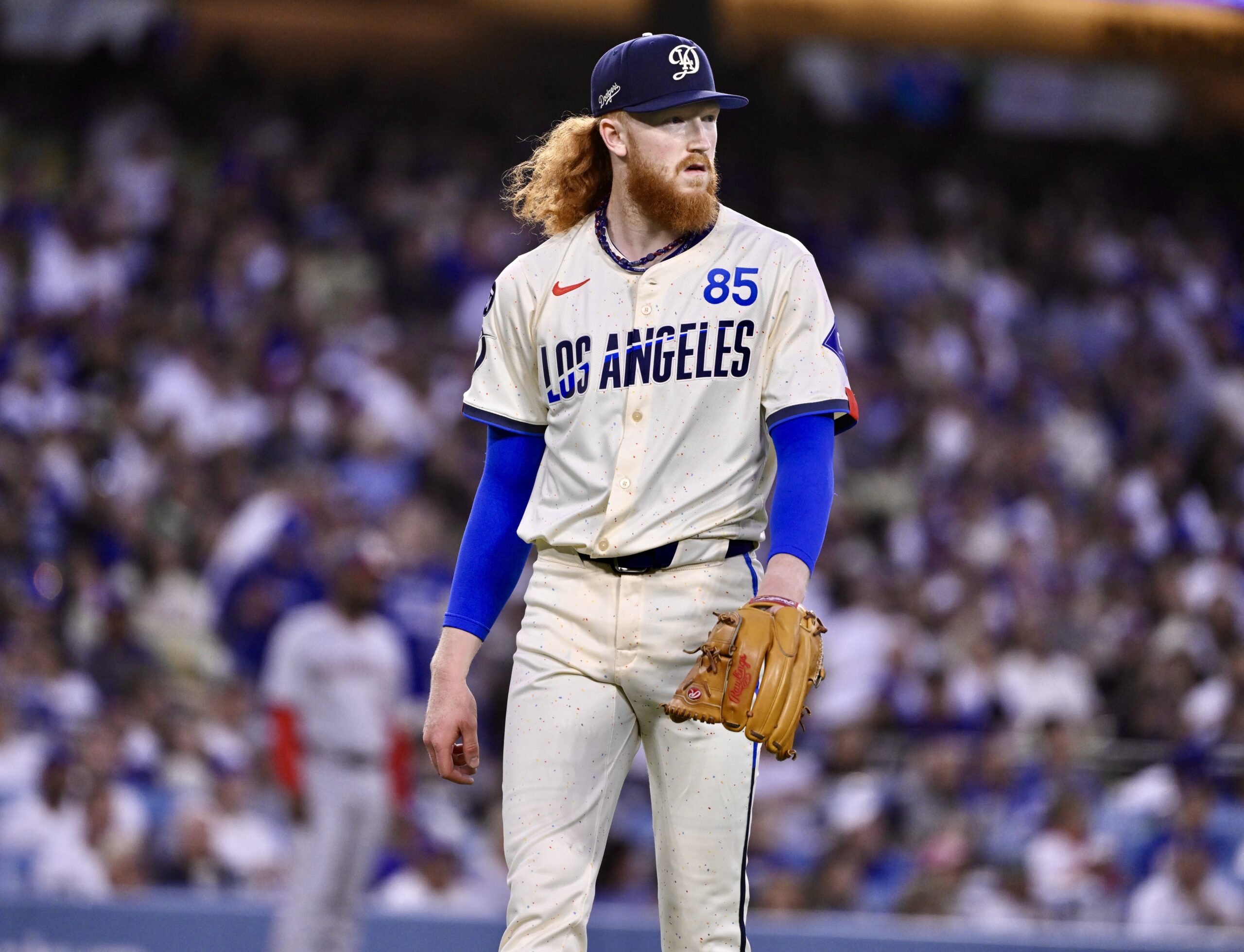 Starting pitcher Dustin May #85 of the Dodgers looks on...