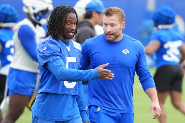 May 28, 2025; Woodland Hills, CA, USA; Los Angeles Rams wide receiver Tutu Atwell (5) talks to head coach Sean McVey during organized team activities at Rams Practice Facility. Mandatory Credit: Kirby Lee-Imagn Images Tutu Atwell, Sean McVay, Rams