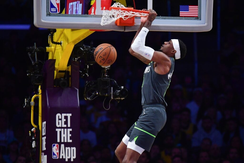 Apr 30, 2025; Los Angeles, California, USA; Minnesota Timberwolves guard Nickeil Alexander-Walker (9) dunks for the basket against the Los Angeles Lakers during the first half in game five of first round for the 2025 NBA Playoffs at Crypto.com Arena. Mandatory Credit: Gary A. Vasquez-Imagn Images