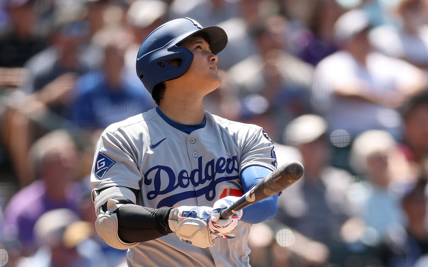 Dodgers star Shohei Ohtani hits a solo home run during...
