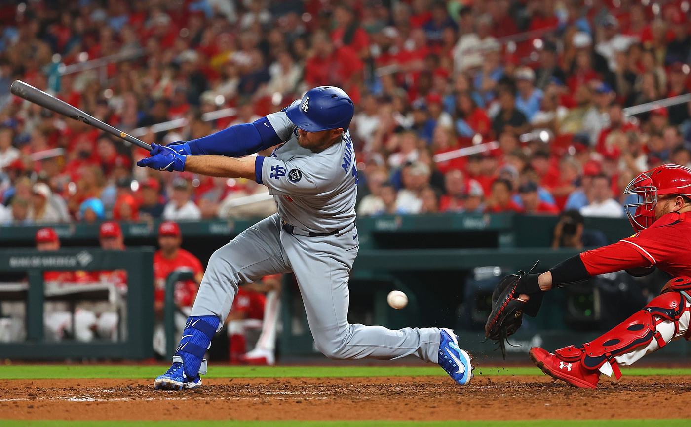 The Dodgers’ Max Muncy strikes out during the eighth inning...