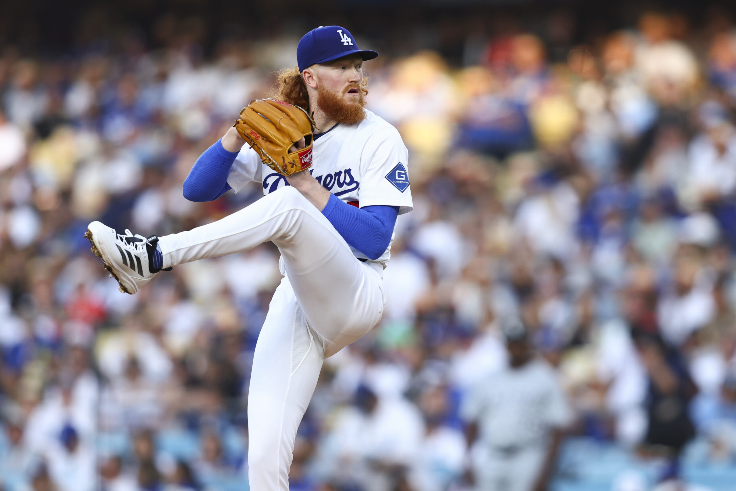 Dodgers starting pitcher Dustin May throws to the plate during...