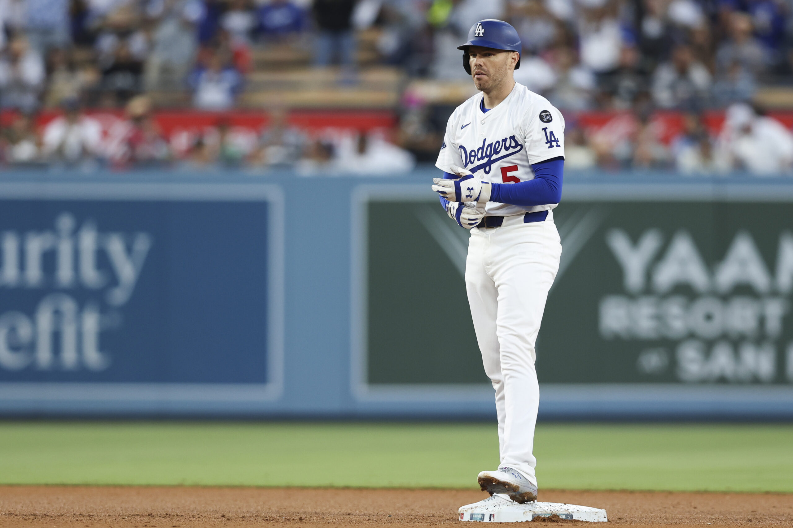 The Dodgers’ Freddie Freeman looks on from second base after...