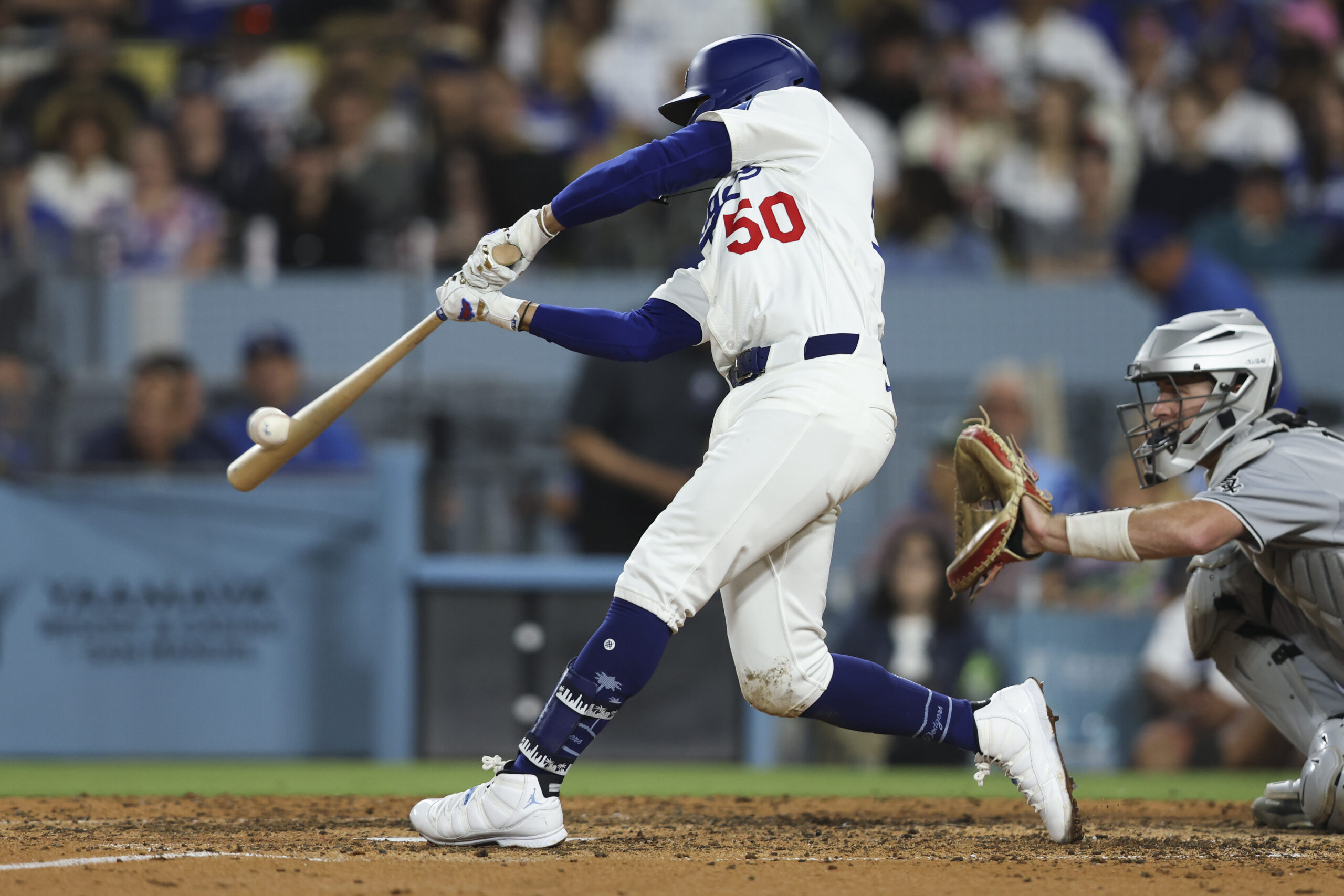 The Dodgers’ Mookie Betts hits a home run during the...