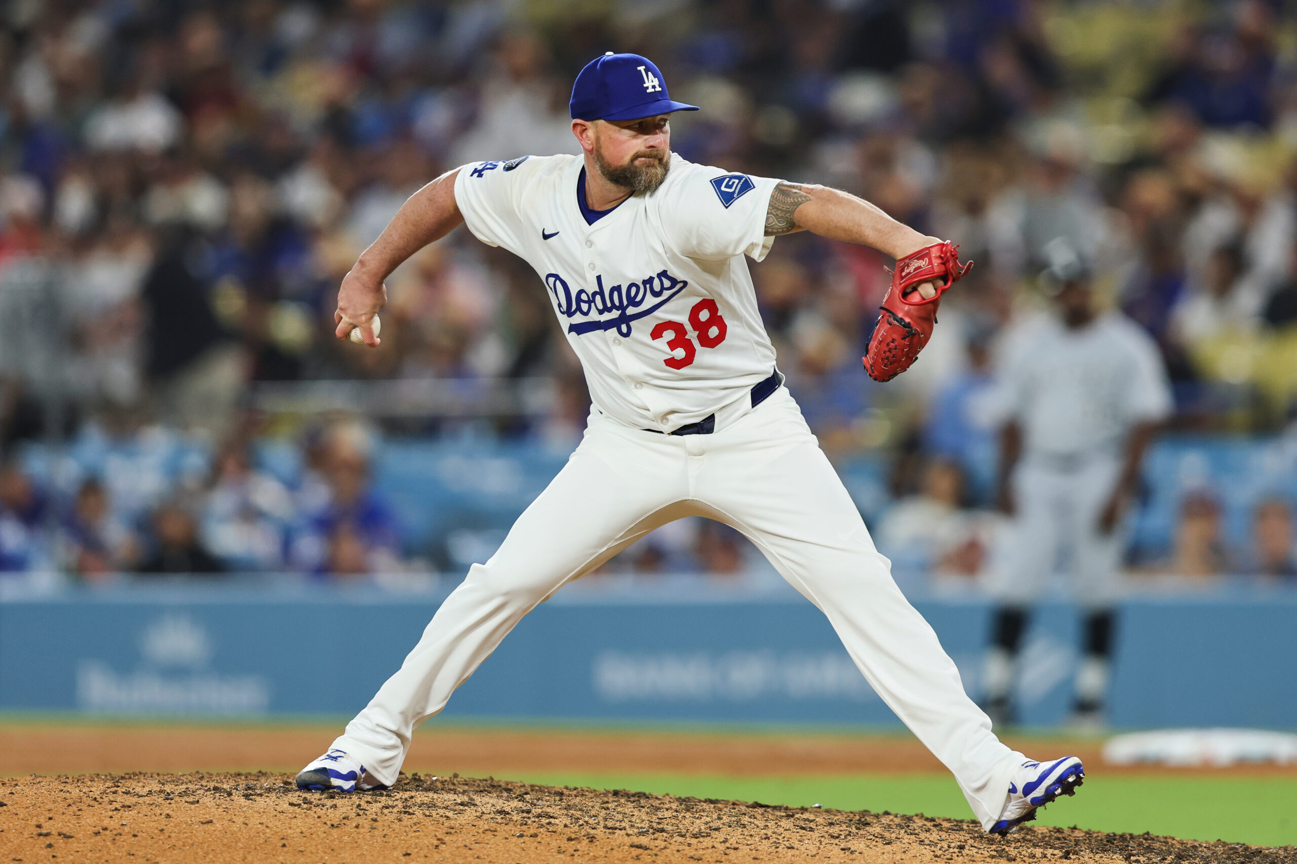Dodgers relief pitcher Kirby Yates throws to a Chicago White...