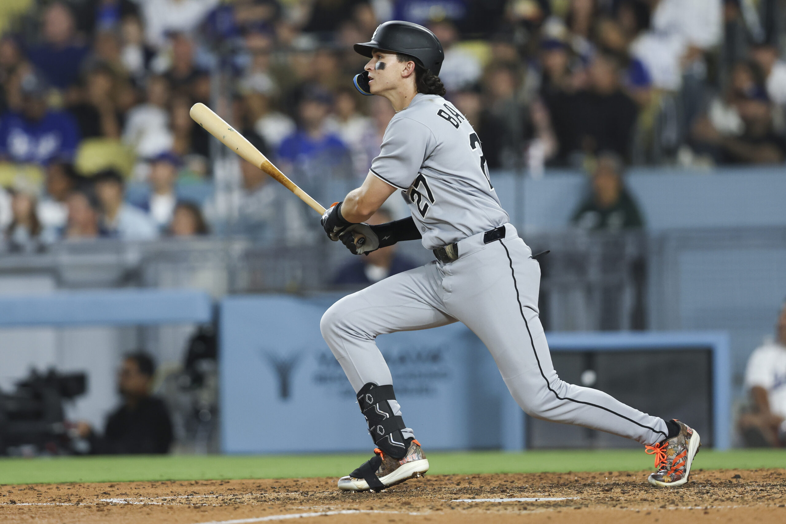 The Chicago White Sox’s Brooks Baldwin looks on after hitting...