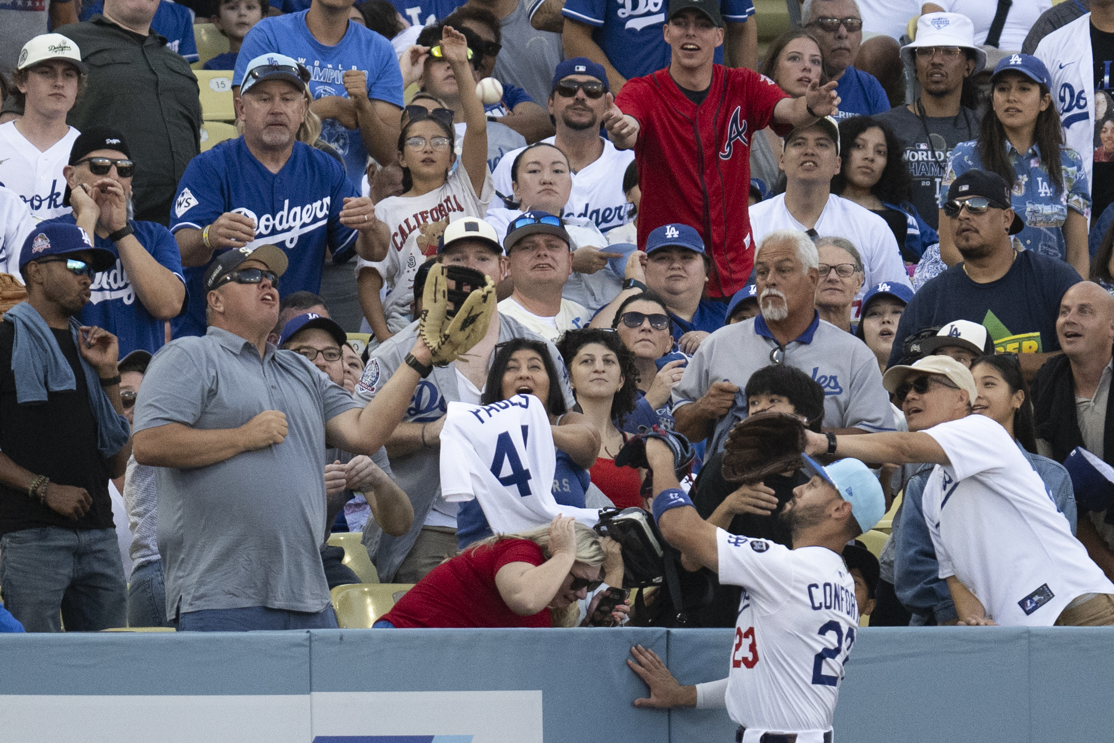 A fan catches a home run hit by Houston Astros’...