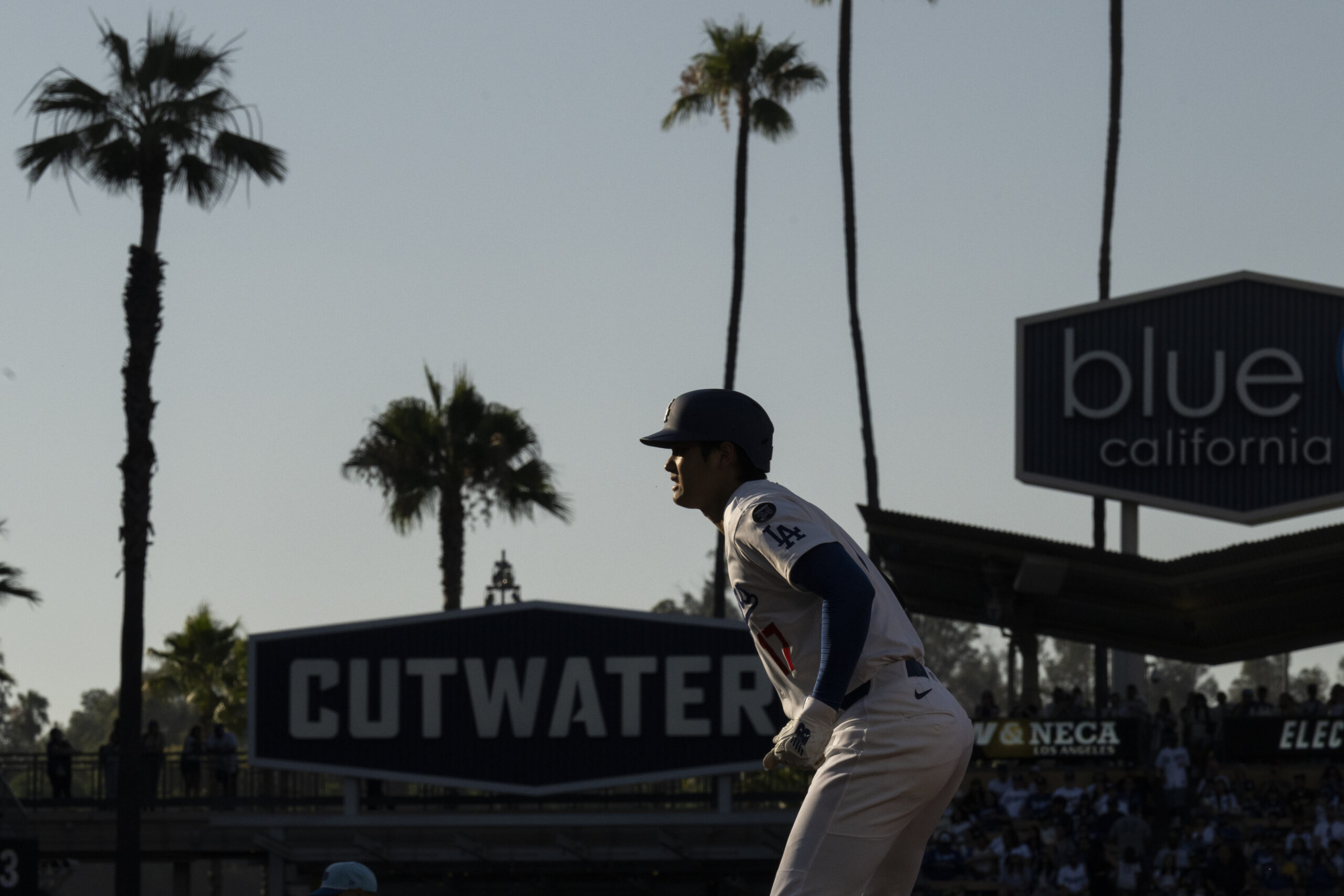 Dodgers’ Shohei Ohtani takes a lead during the first inning...