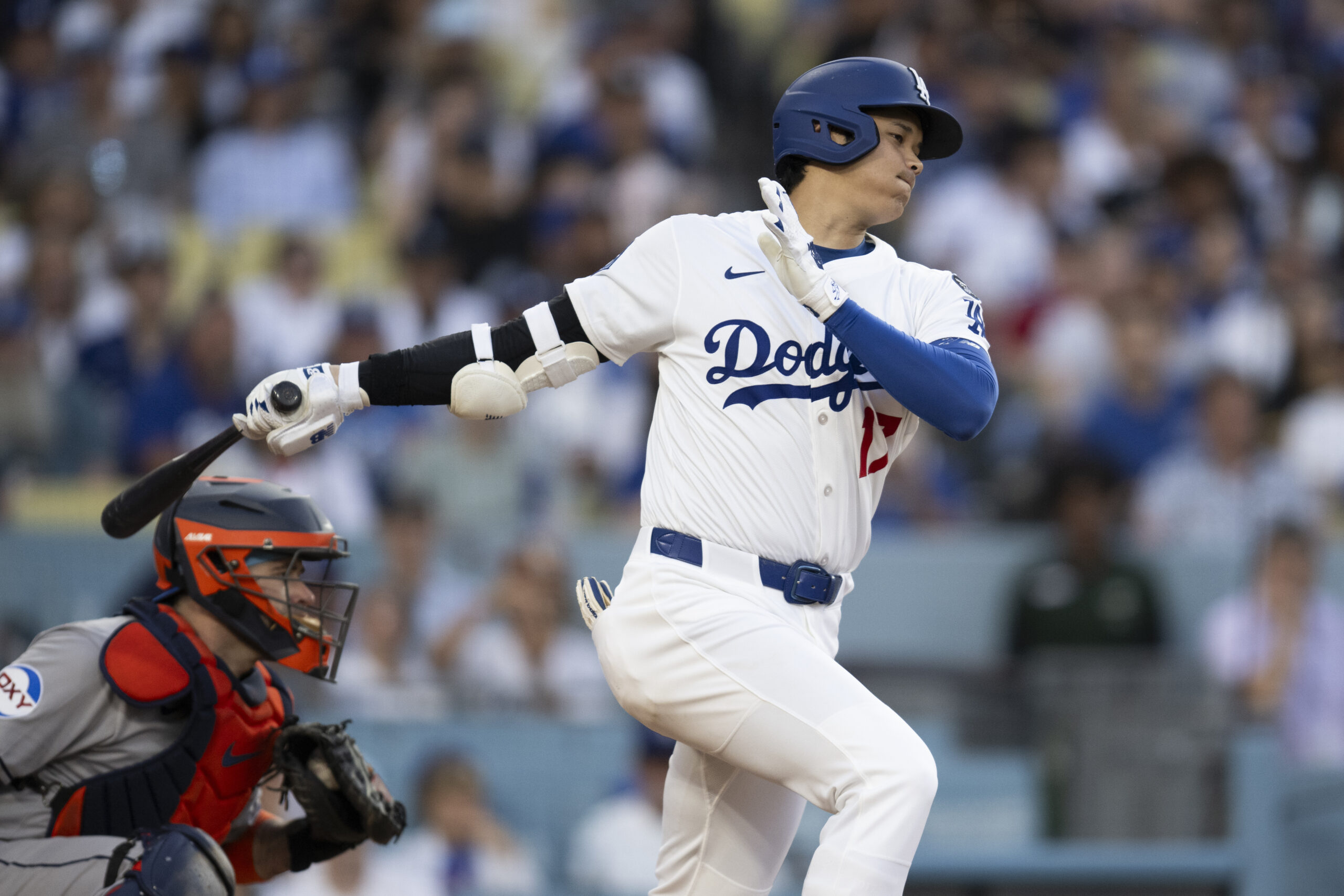 Dodgers’ Shohei Ohtani strikes out swinging during the fifth inning...