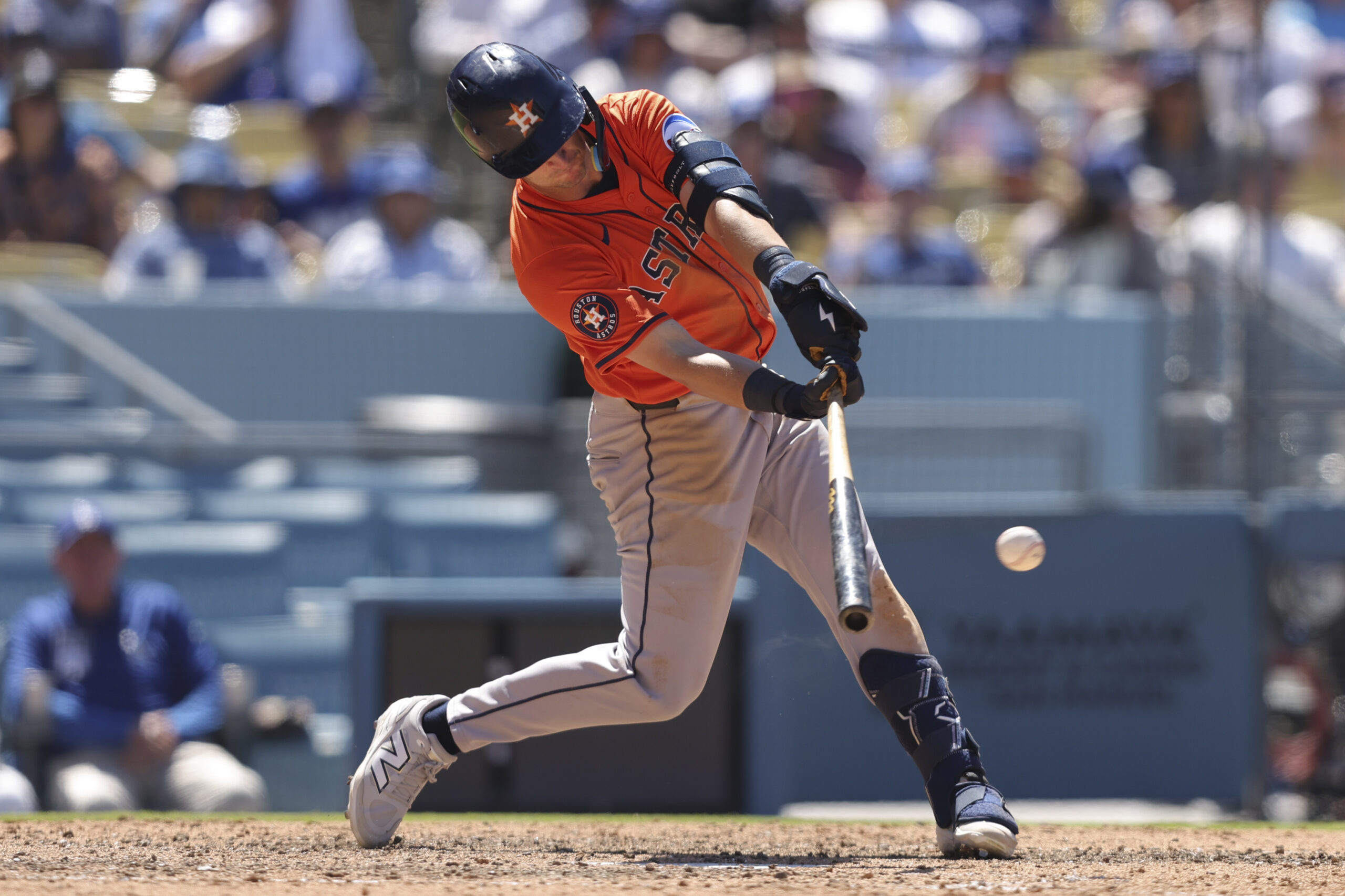 Houston Astros’ Zack Short hits a single during the eighth...