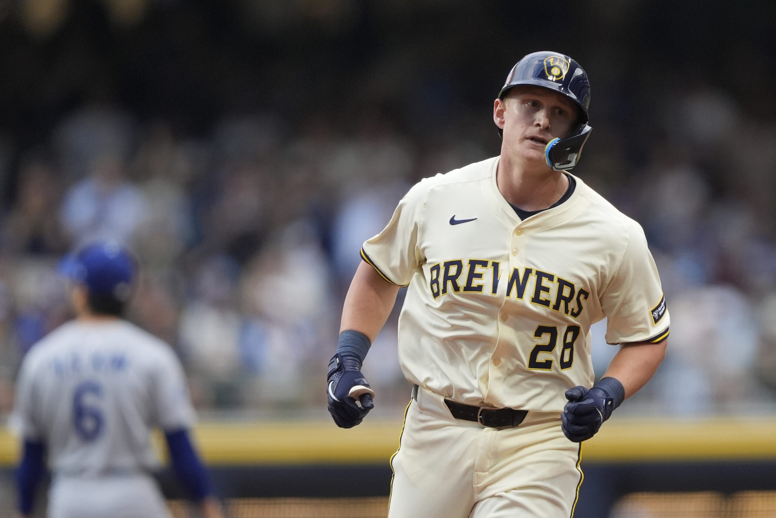 The Milwaukee Brewers’ Andrew Vaughn runs the bases after hitting...