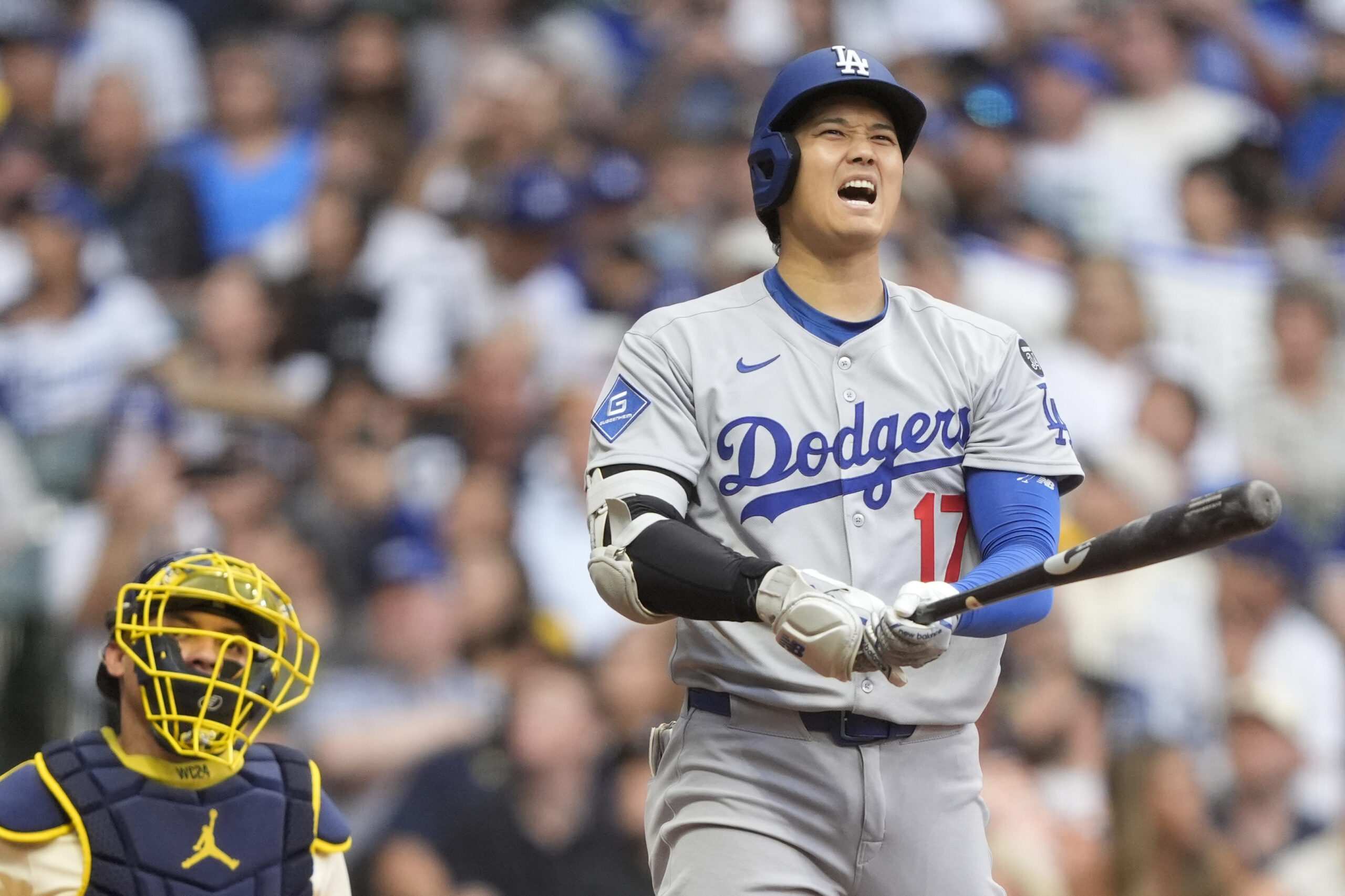 Dodgers star Shohei Ohtani reacts during an at-bat during the...