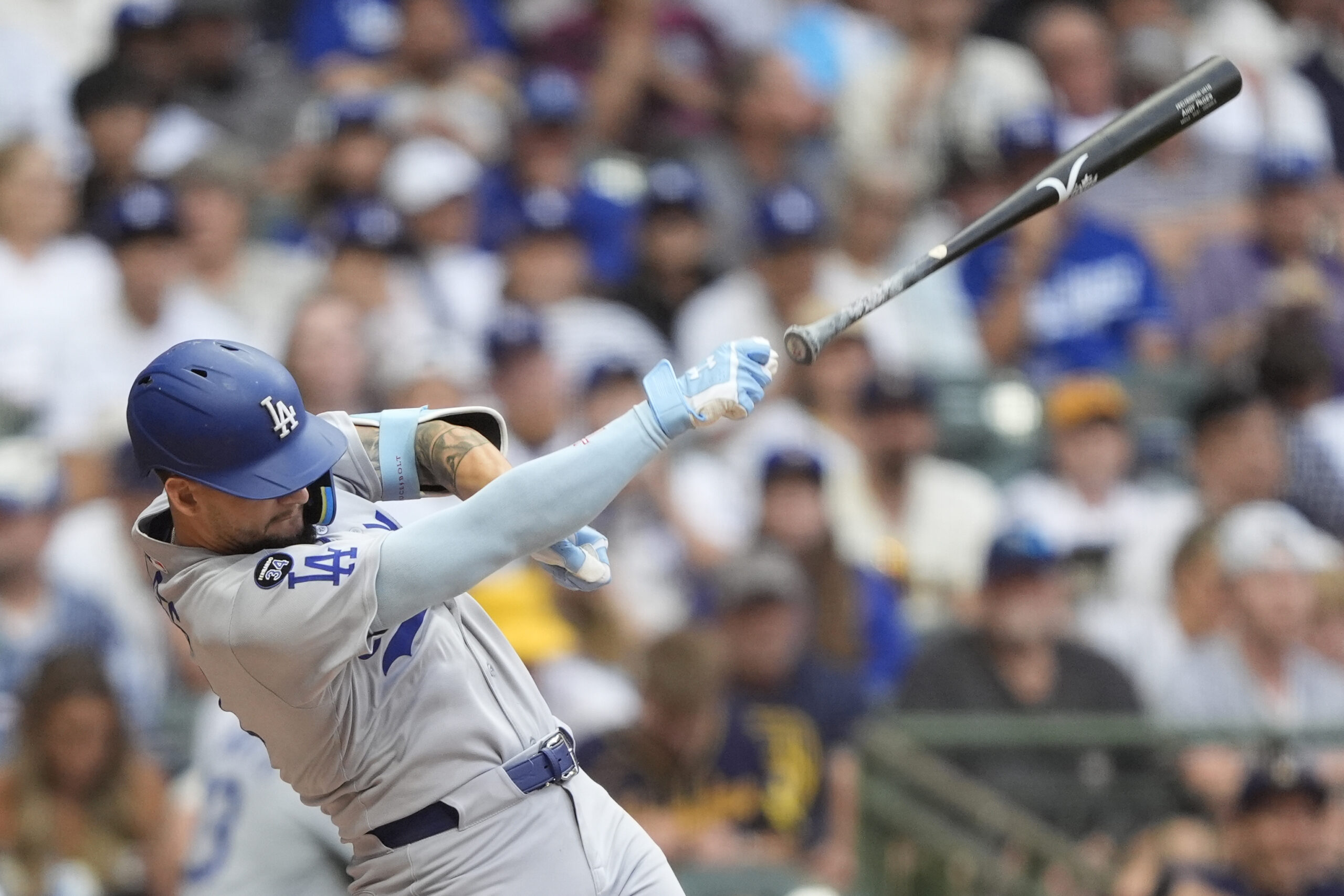 The Dodgers’ Andy Pages loses control of his bat on...
