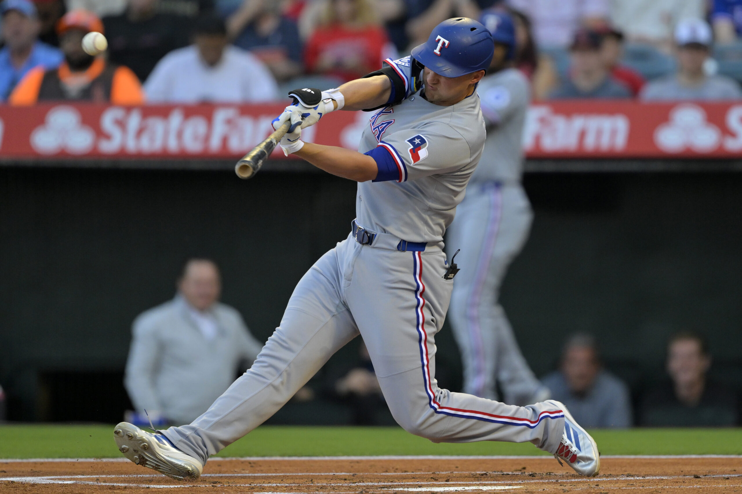 The Texas Rangers’ Corey Seager hits a two-run home run...