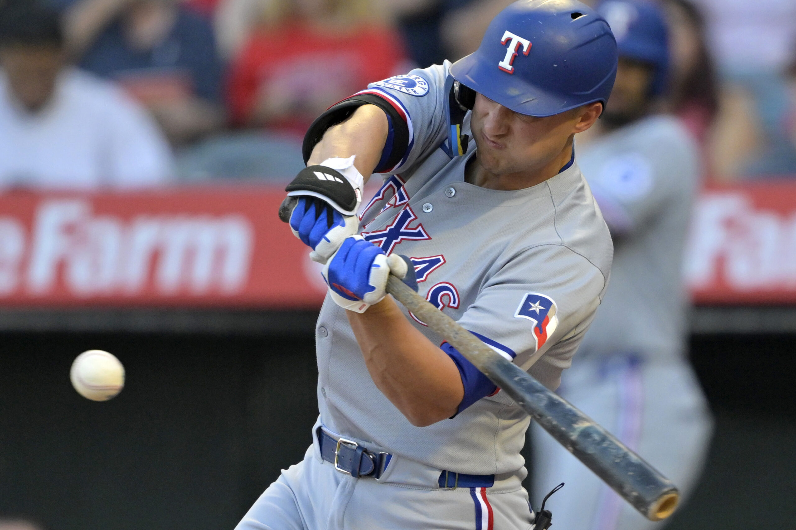 The Texas Rangers’ Corey Seager hits a two-run home run...