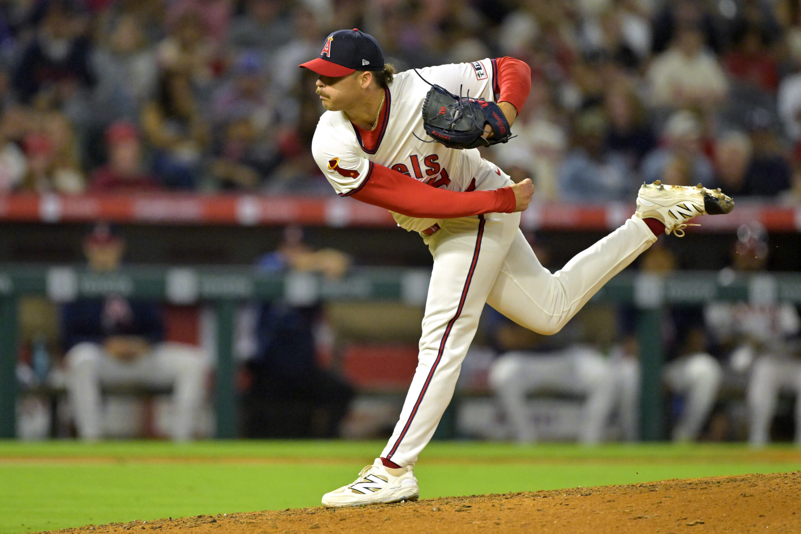 Angels relief pitcher Victor Mederos throws to the plate during...