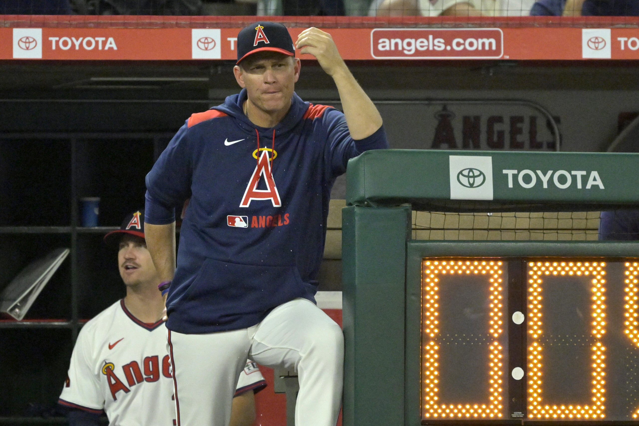 Angels interim manager Ray Montgomery looks on from the dugout...