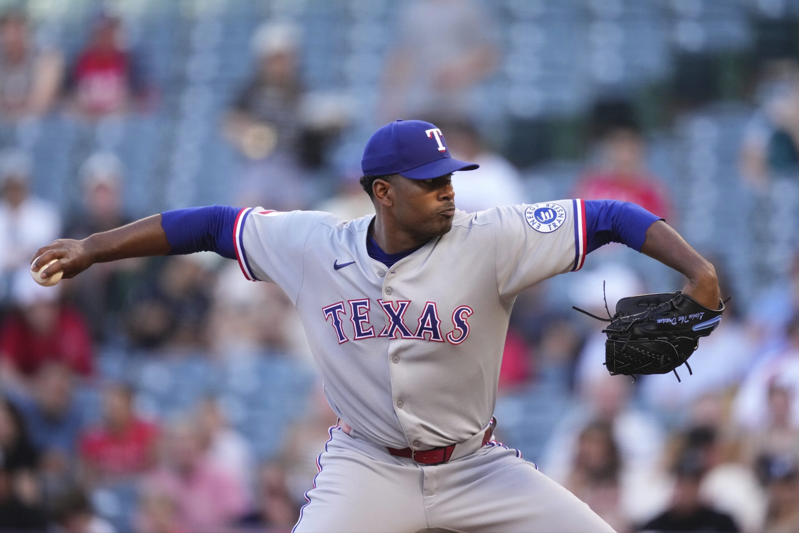 Texas Rangers starting pitcher Kumar Rocker throws to the plate...