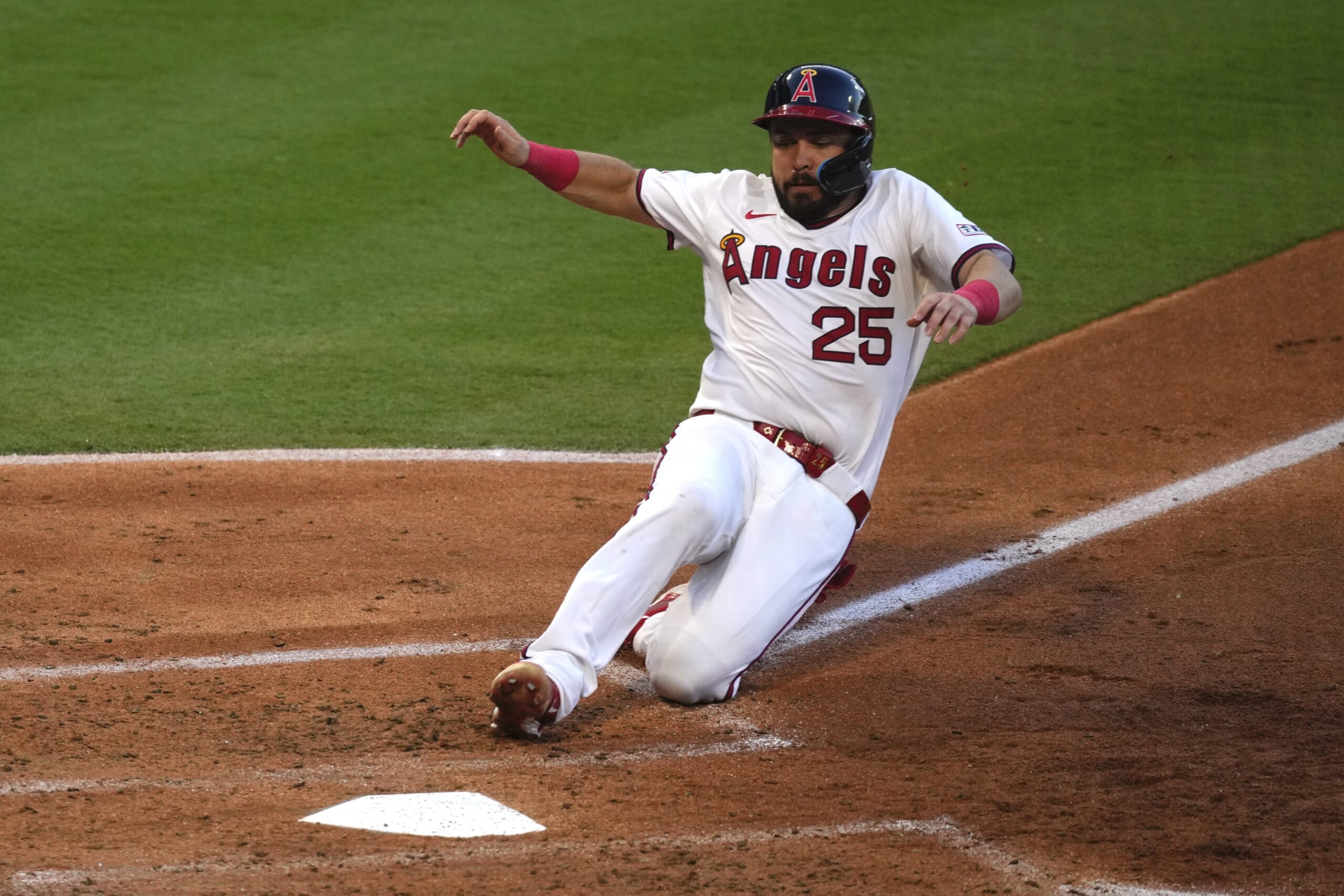 The Angels’ Travis d’Arnaud scores on a sacrifice fly by...