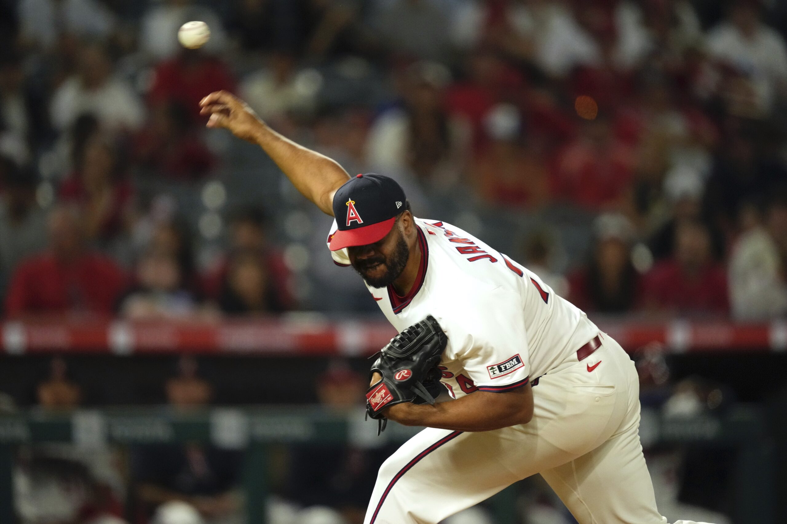 Angels relief pitcher Kenley Jansen throws to the plate during...
