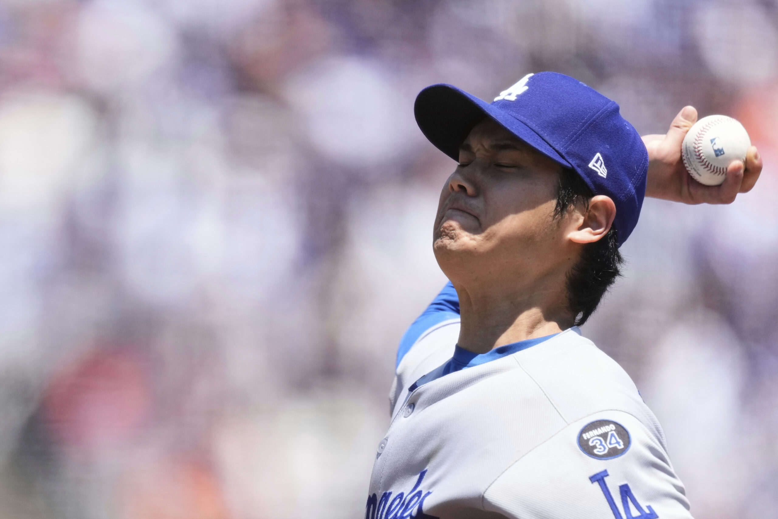 Los Angeles Dodgers’ Shohei Ohtani pitches to a San Francisco...