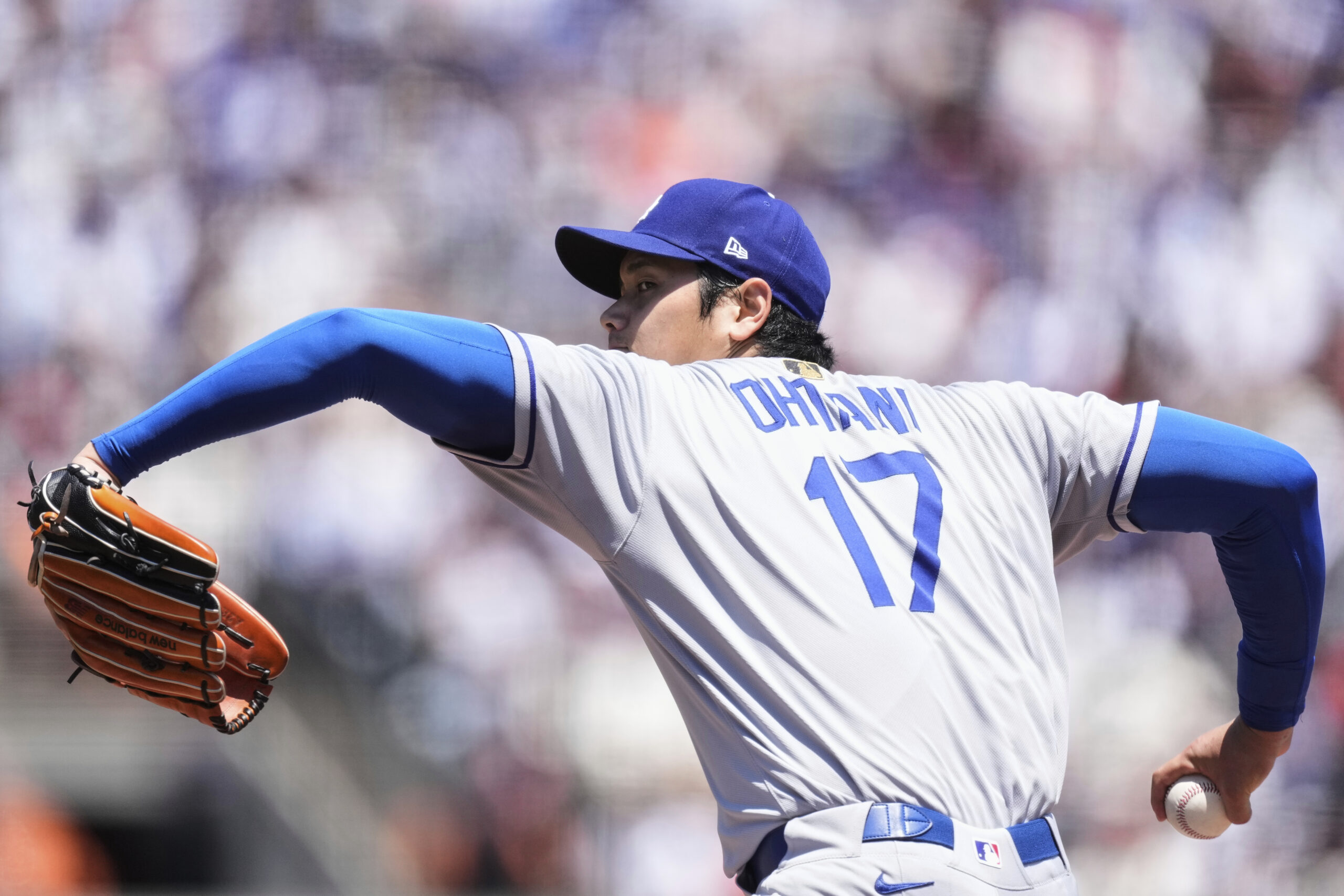 Los Angeles Dodgers’ Shohei Ohtani pitches to a San Francisco...