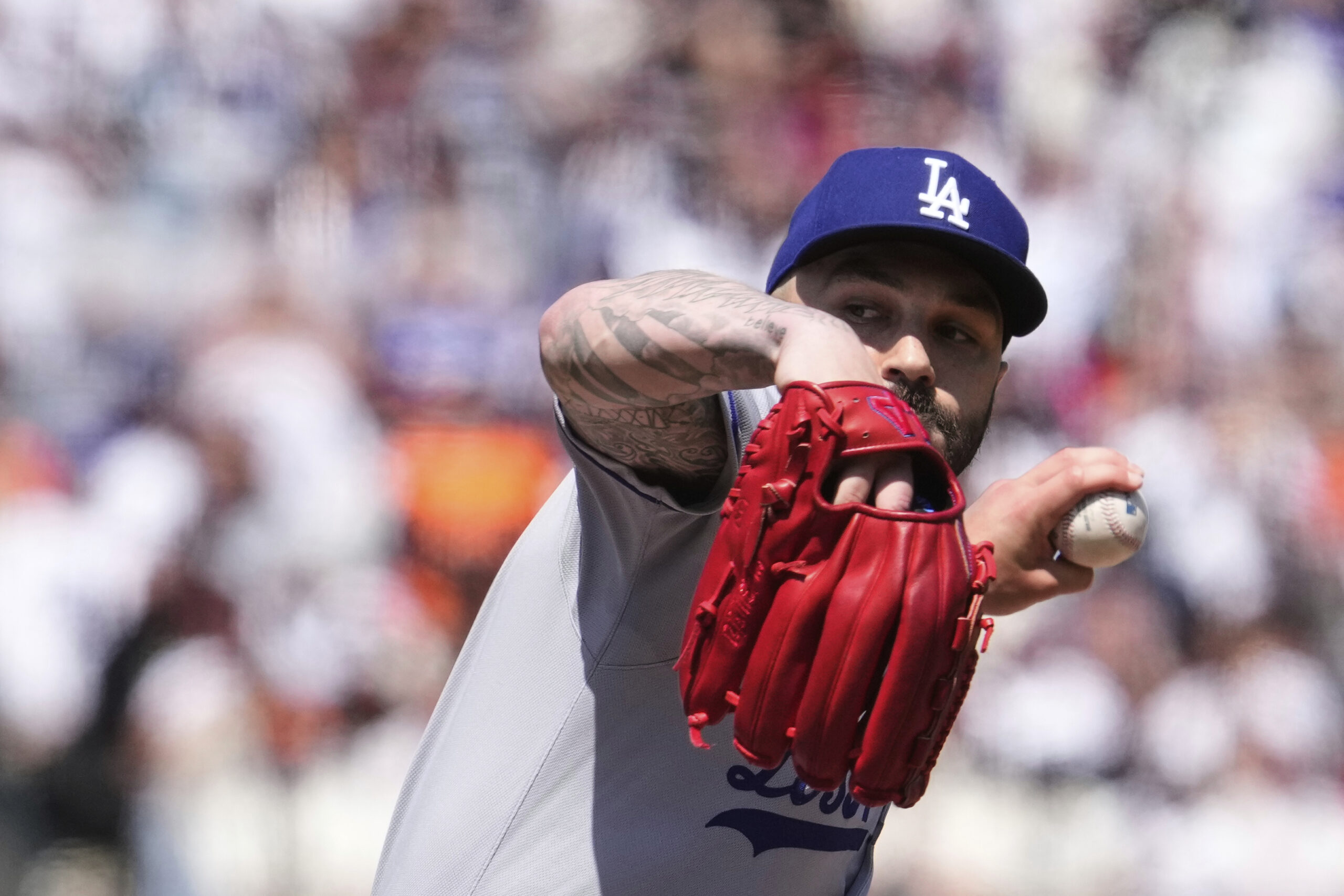Los Angeles Dodgers’ Tanner Scott pitches to a San Francisco...