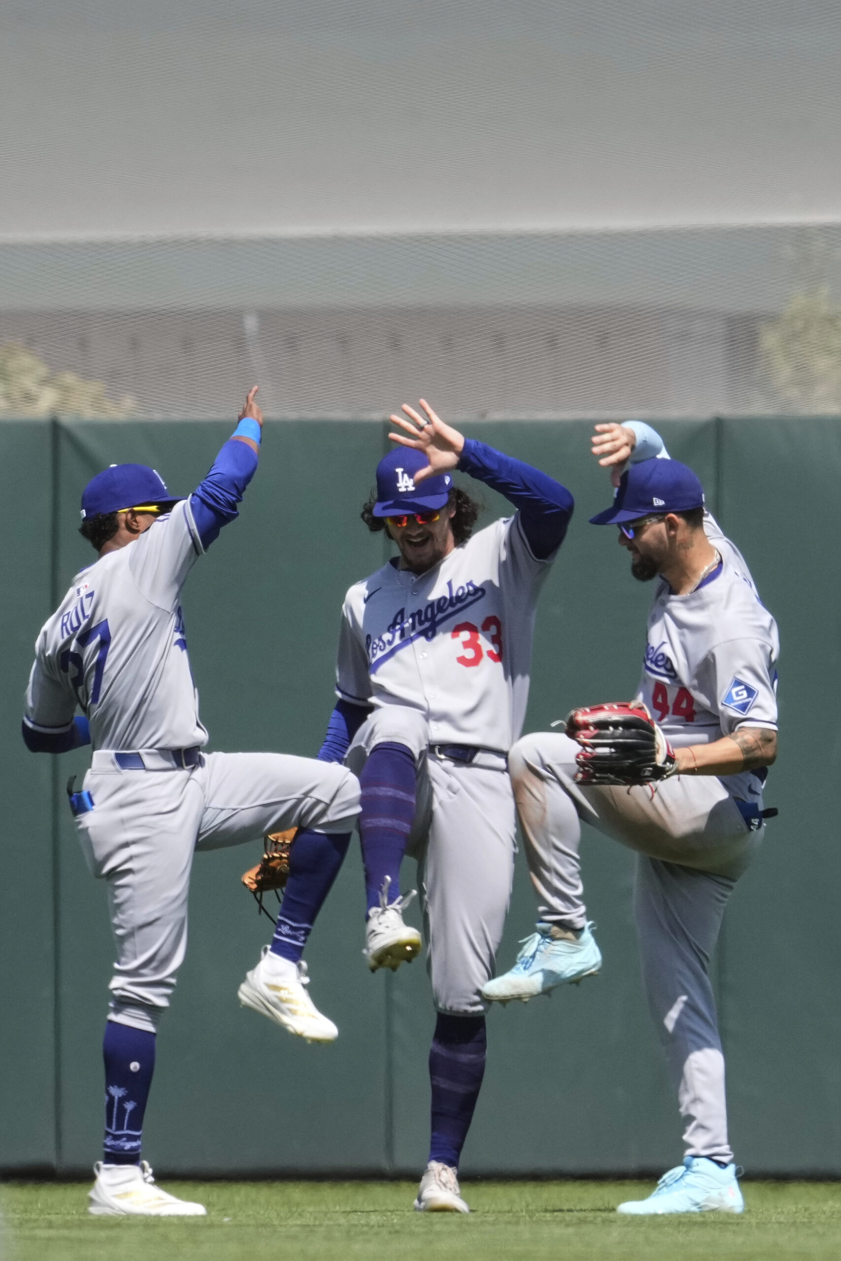 From left, Los Angeles Dodgers right fielder Teoscar Hernández, center...